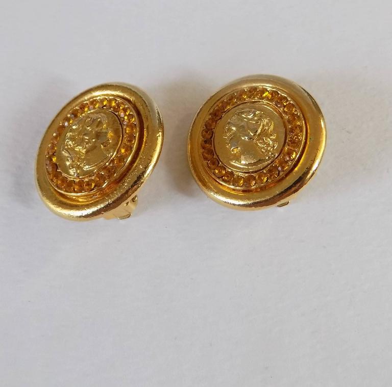 Gold Tone Clip on earrings at 1stDibs