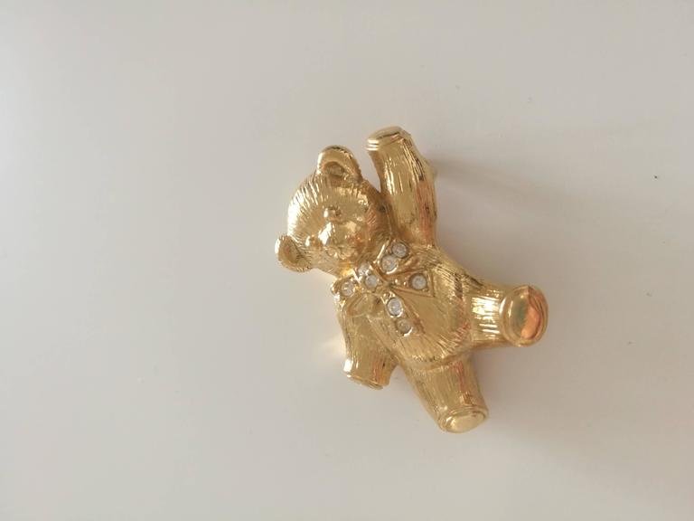 Avon Gold tone bear Brooch at 1stDibs
