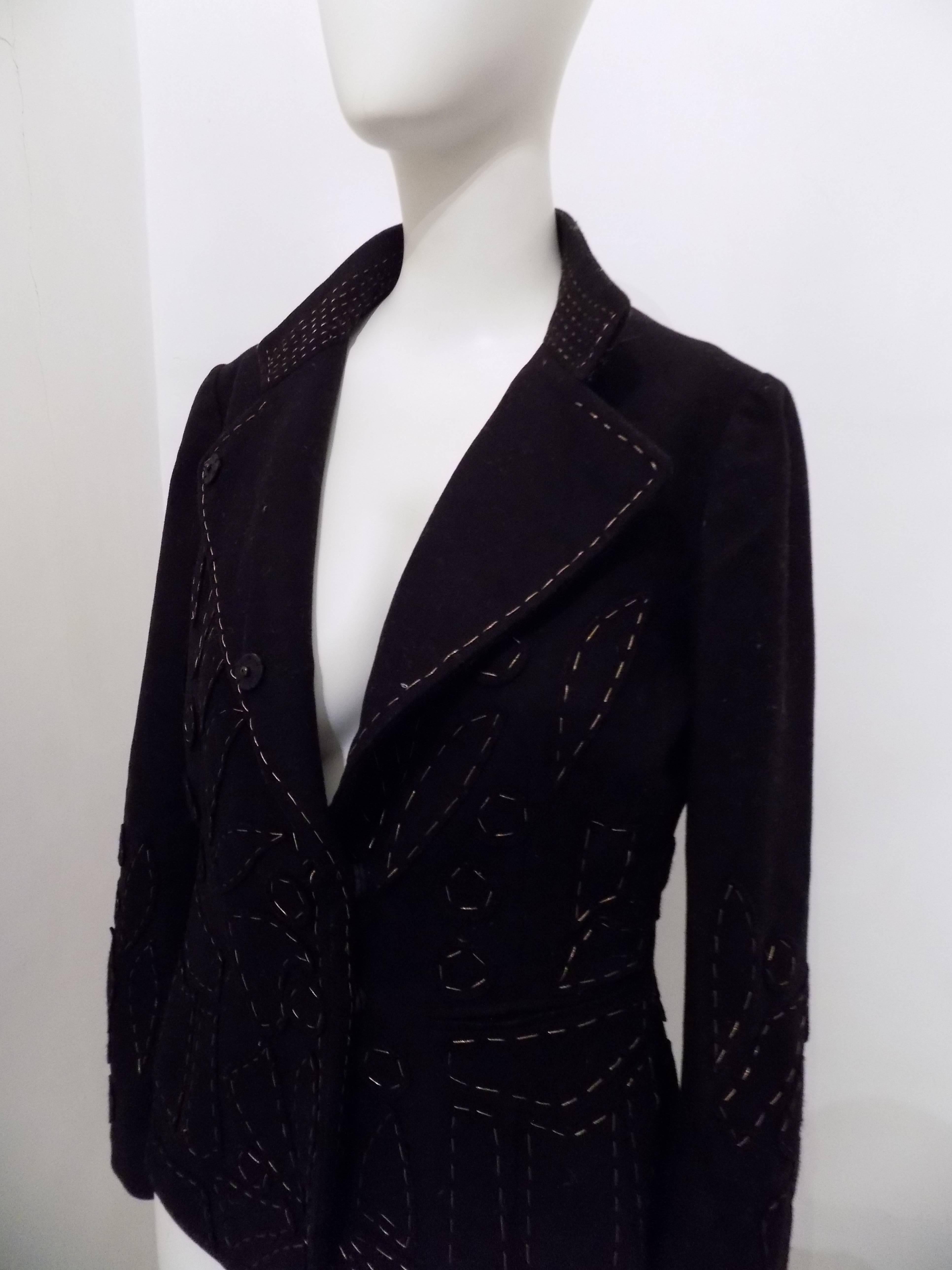 Moschino Black Jacket 
Black jacket with gold tone stamps all over
totally made in italy in italian size range m