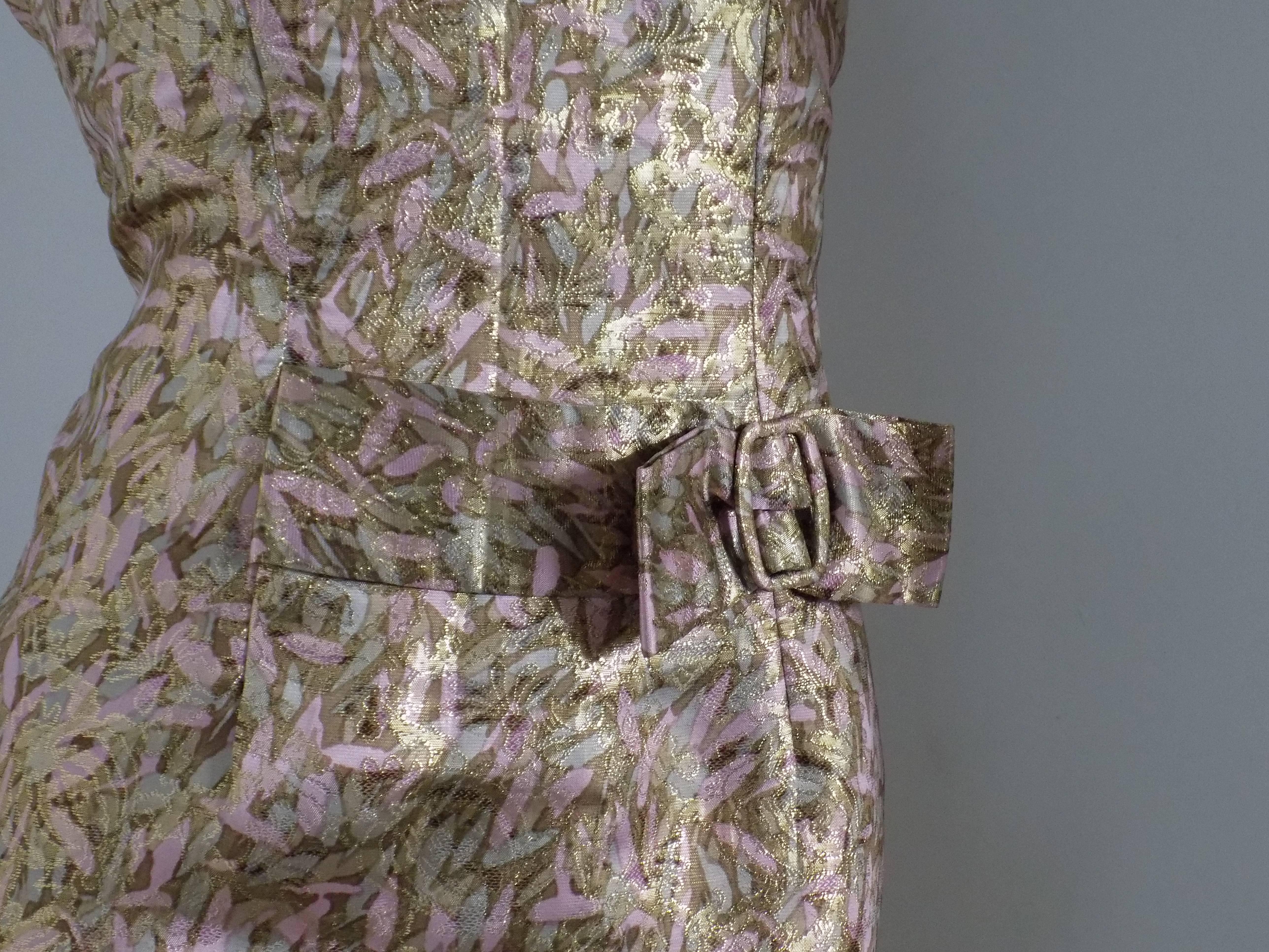 1980s Tailored Dress

Gold tone with flowers printed on it dress