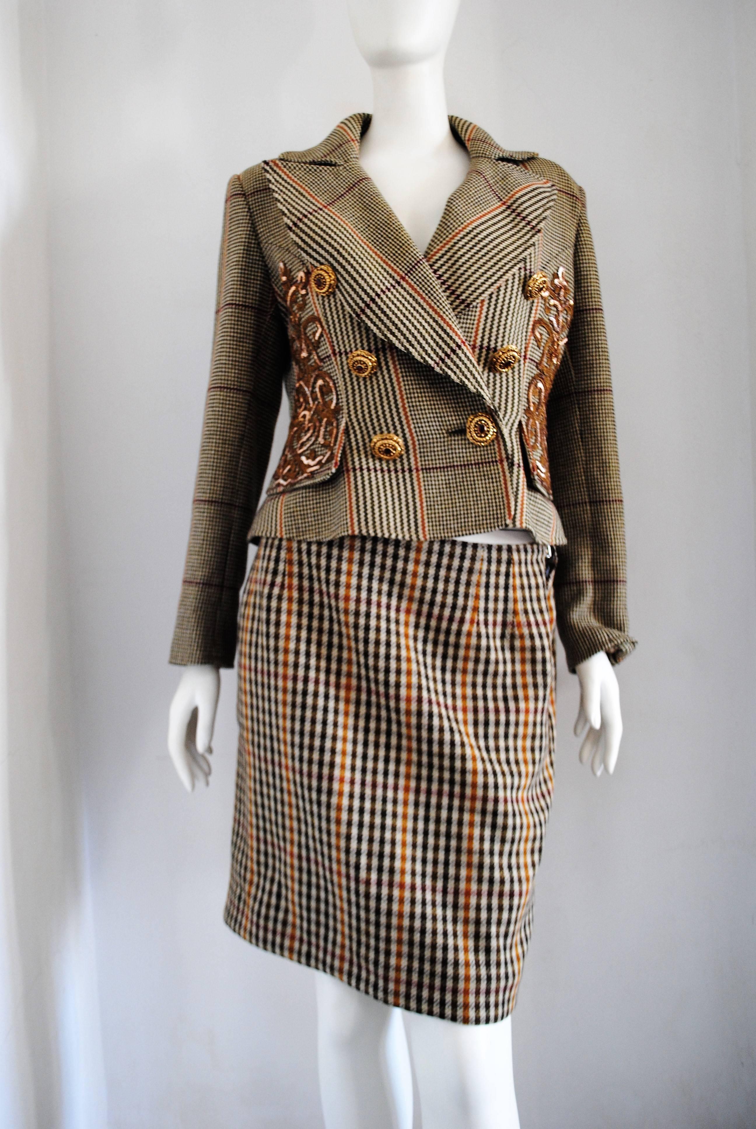 Christian Lacroix Skirt suit
Totally made in france in size 38 
Gold tone bottons