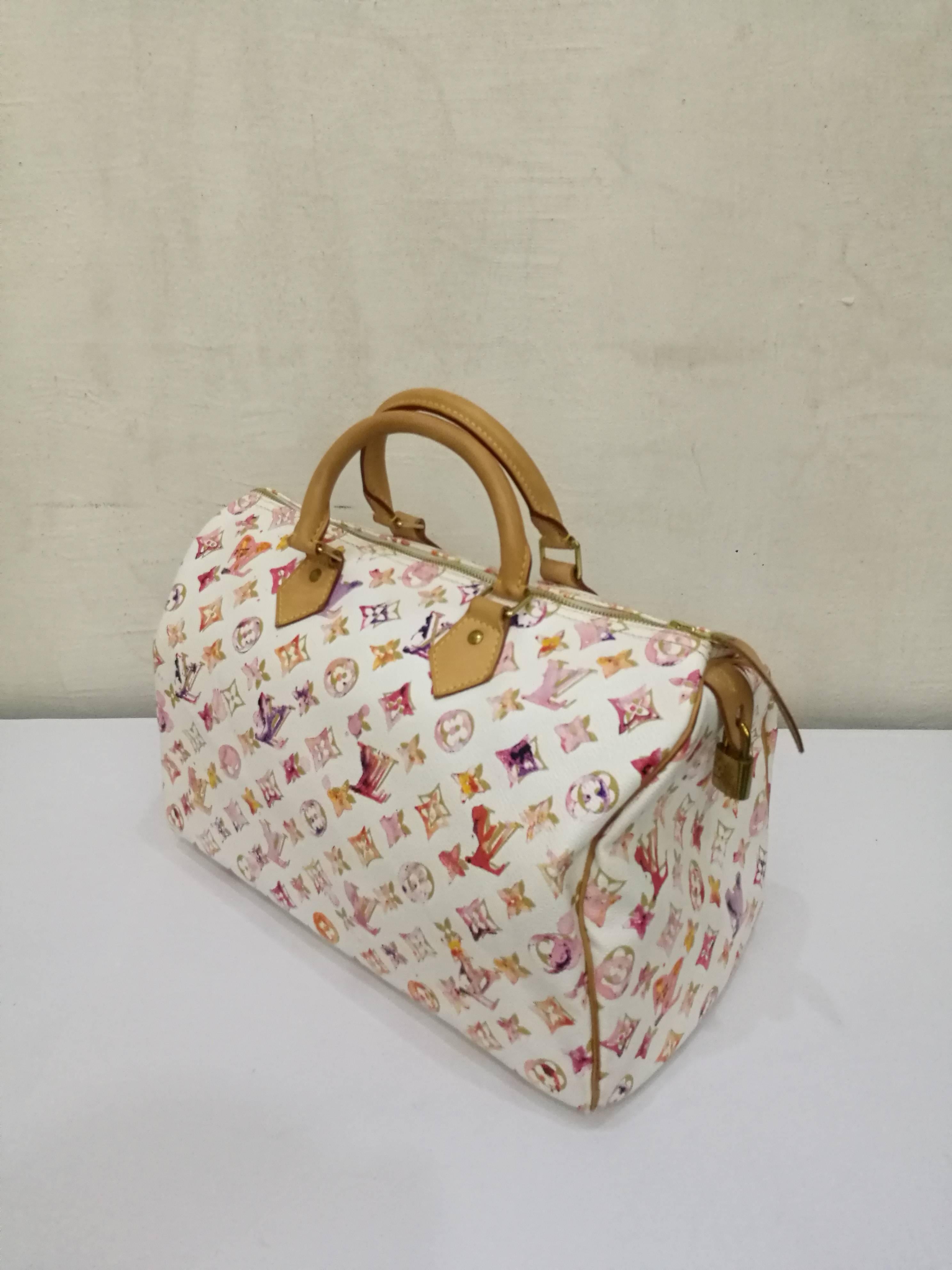 This Limited Edition Louis Vuitton White Aquarelle Watercolor Speedy 35 is SOLD OUT in boutiques where it was sold exclusively in Japan and Hawaii.  A stunning collaboration between Richard Prince and Marc Jacobs for 2008. Desirable color scheme