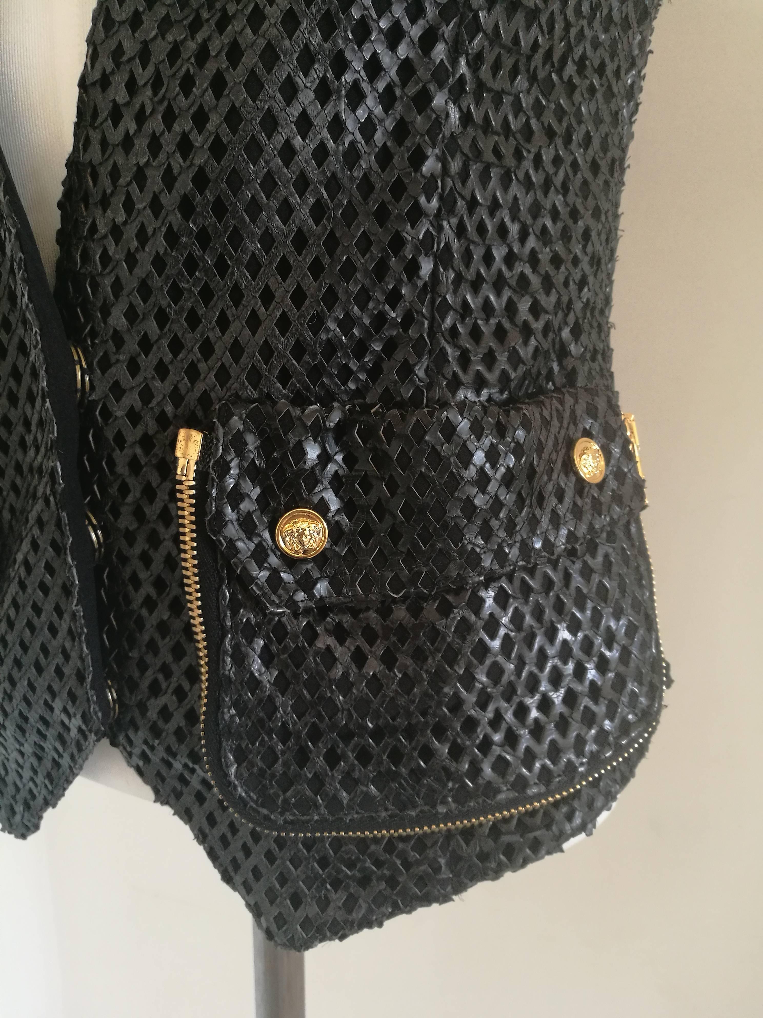 Versace Black Perforated Leather Gilet
Totally made in italy in size M 
Gold tone hardware