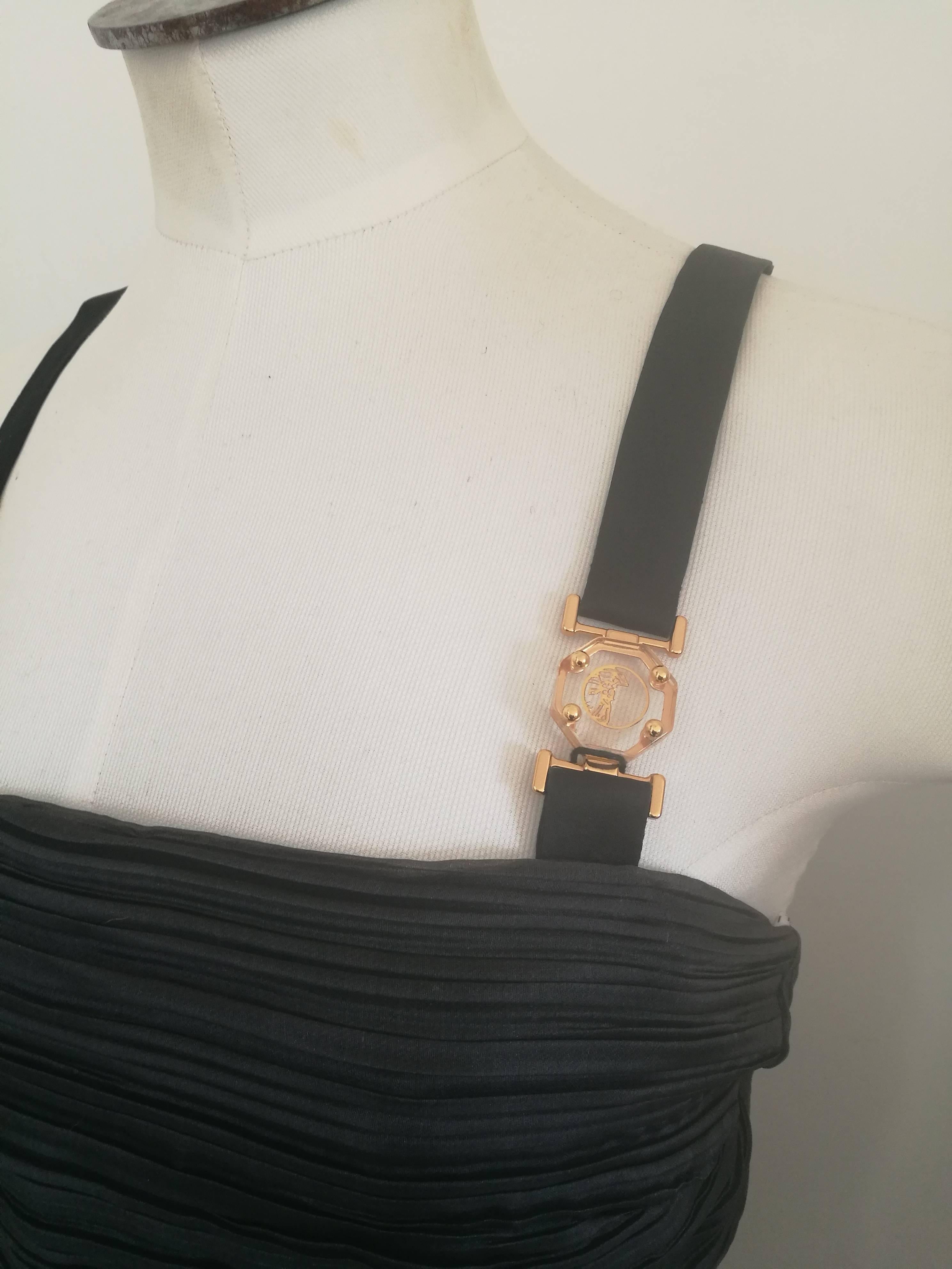 Versus by Gianni Versace Black Dress NWOT
Embellished Gold tone straps
Totally made in italy in italian size range 38
