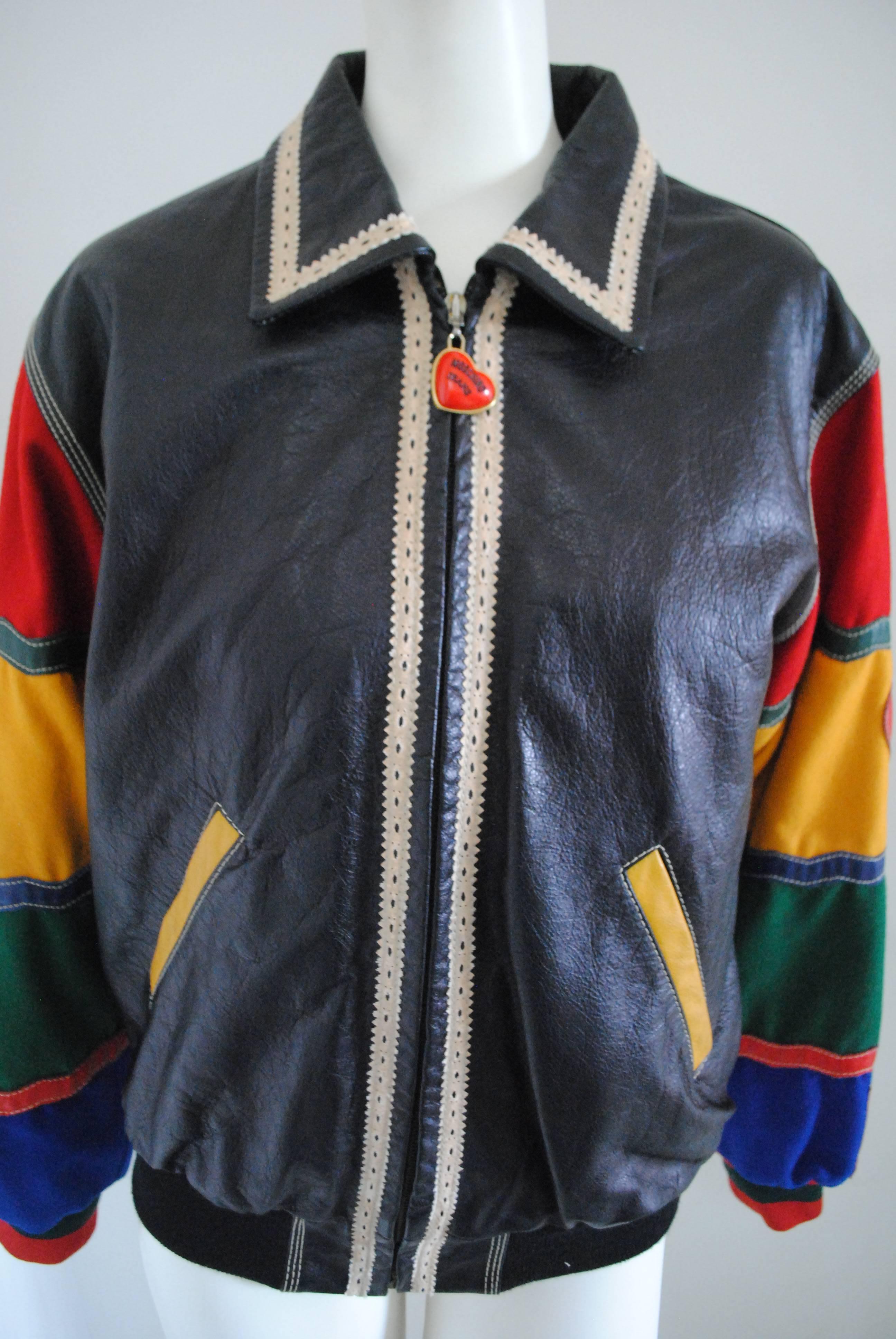 1980s Rare Moschino Jeans Peace & Love Vintage Leather Wool Jacket

Unique and hard to find vintage Moschino Jeans Jacket.

Both shoulder are wool with leather inserts. On the right side Peace on the left side Love and M (Moschino)

All sorrounded