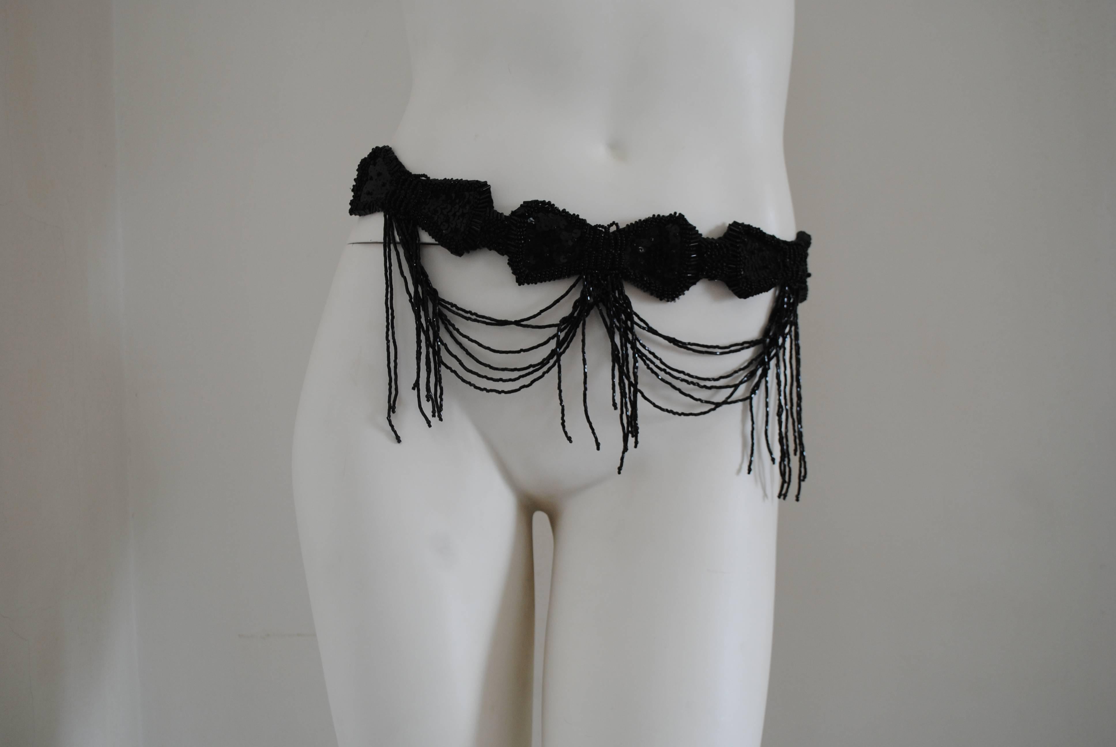 1980s Unknown Black Beads and Sequins Belt Bows

Totally made in italy

total lenght 87 cm