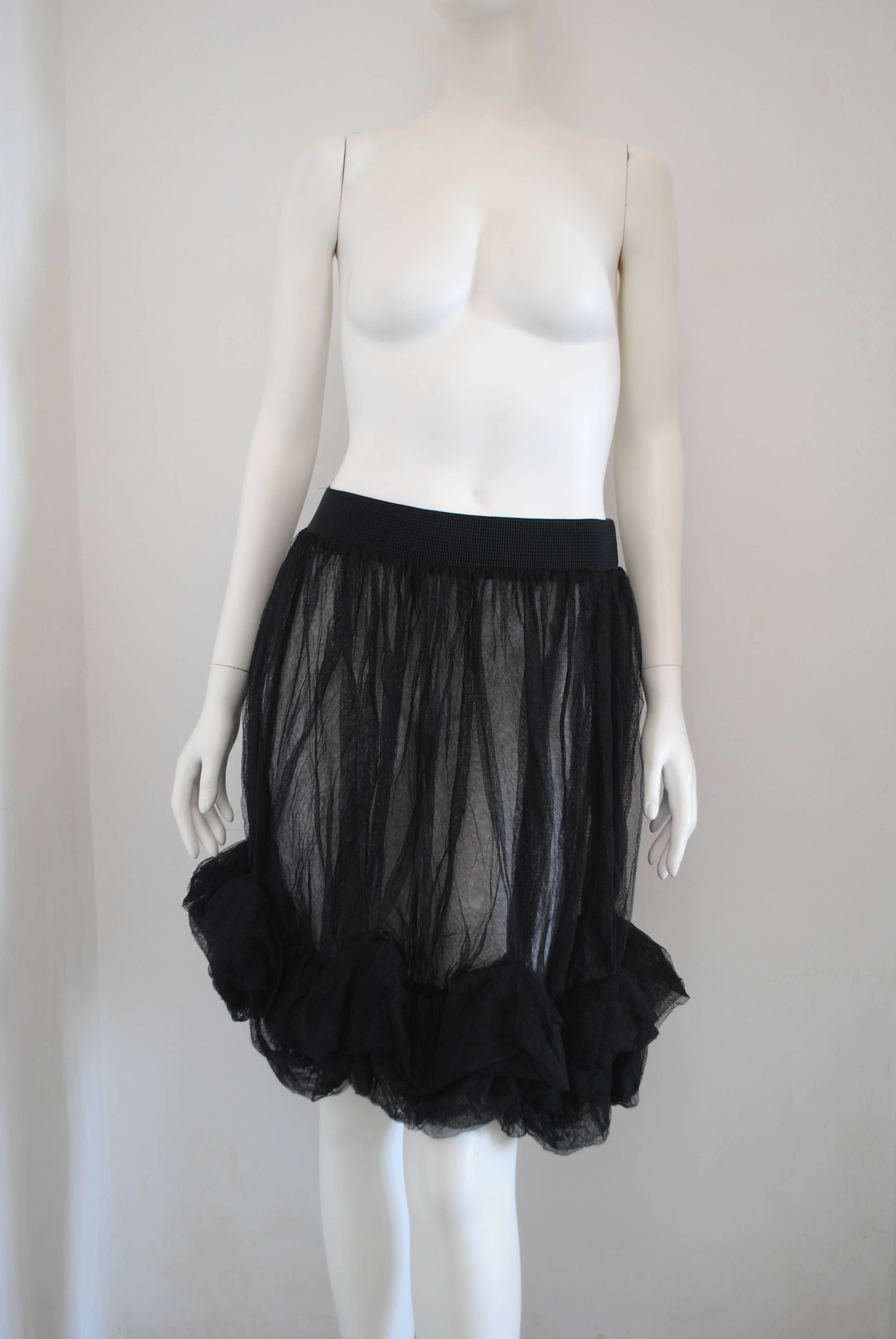 Black See Through Vintage Skirt

totally made in France in size M

Composition is polyamide

Elastic Waist: From 66 cm up to 100 cm

