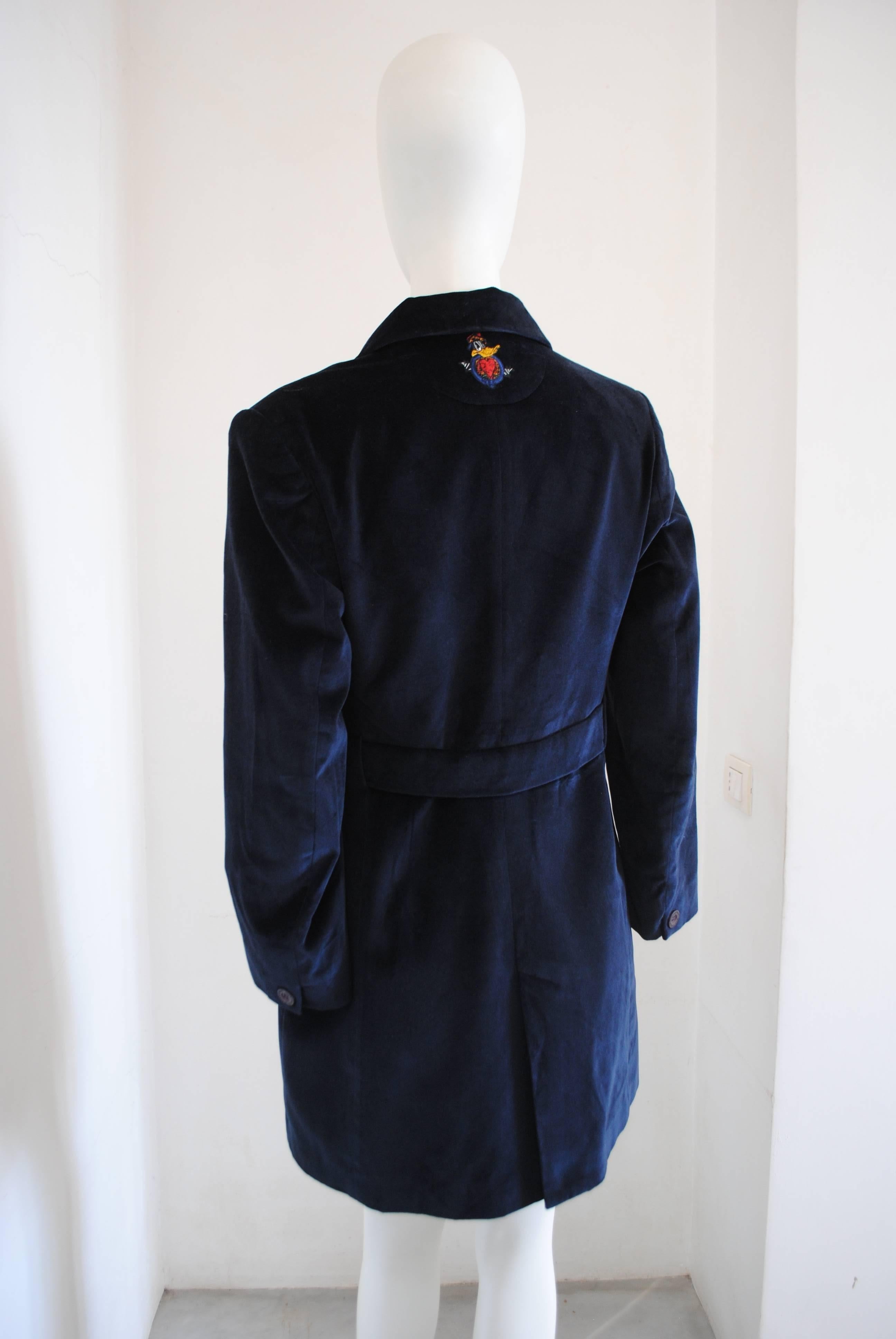 Manteau en velours bleu Jc De Castelbajac des années 1980 

blu manteau totalement made in italy en italie taille 40

Composition : Coton et polyestère