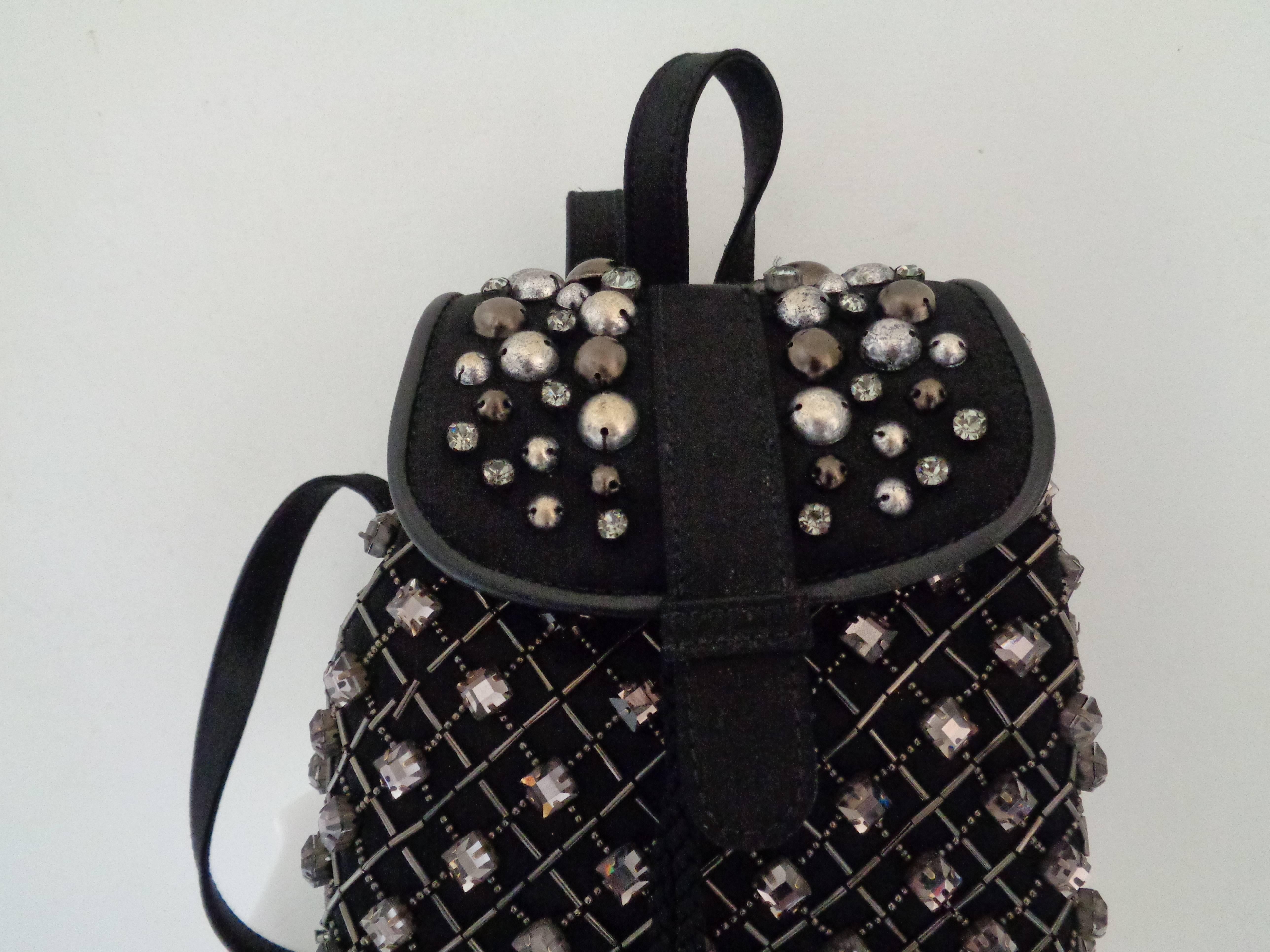 Alberta Ferretti Black with Swarovski Backpack NWOT

Geometric pattern jewel backpack

totally made in italy

Comes with dust bag

