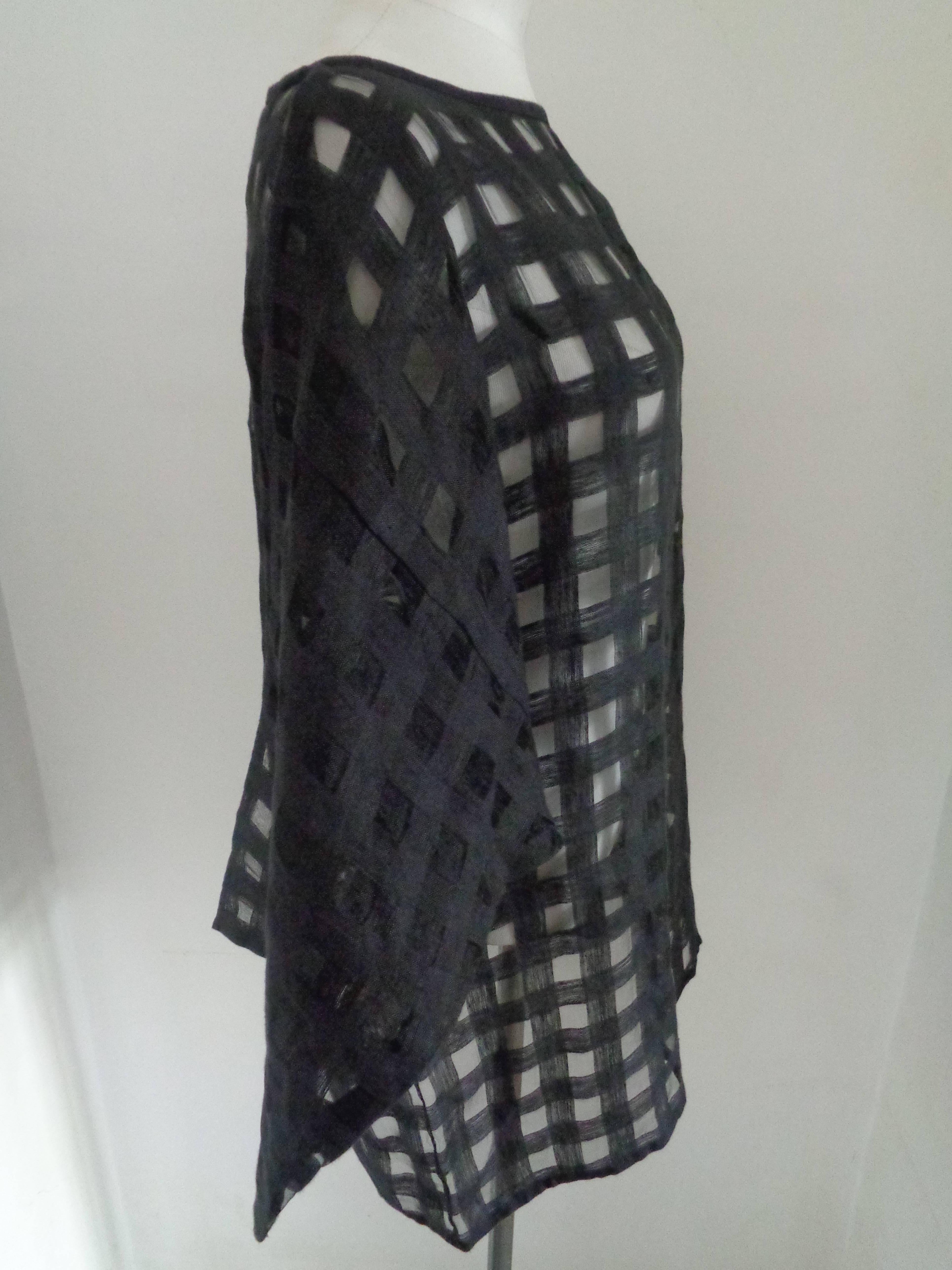 1980s Effegi Black See-through Linen Shirt

Totally made in italy in italian size range 42