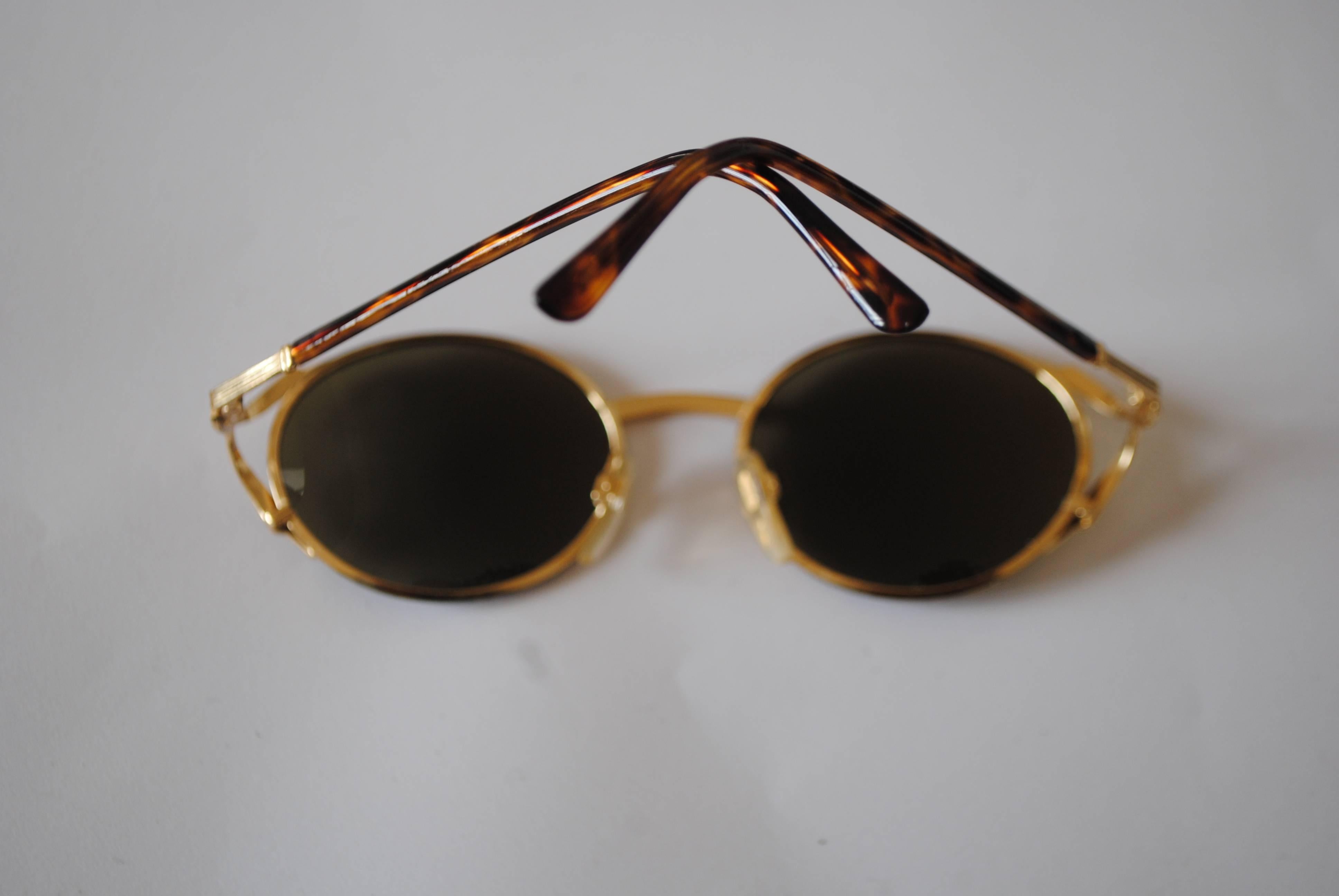 Polaroid tortoise gold hw sunglasses In Excellent Condition In Capri, IT