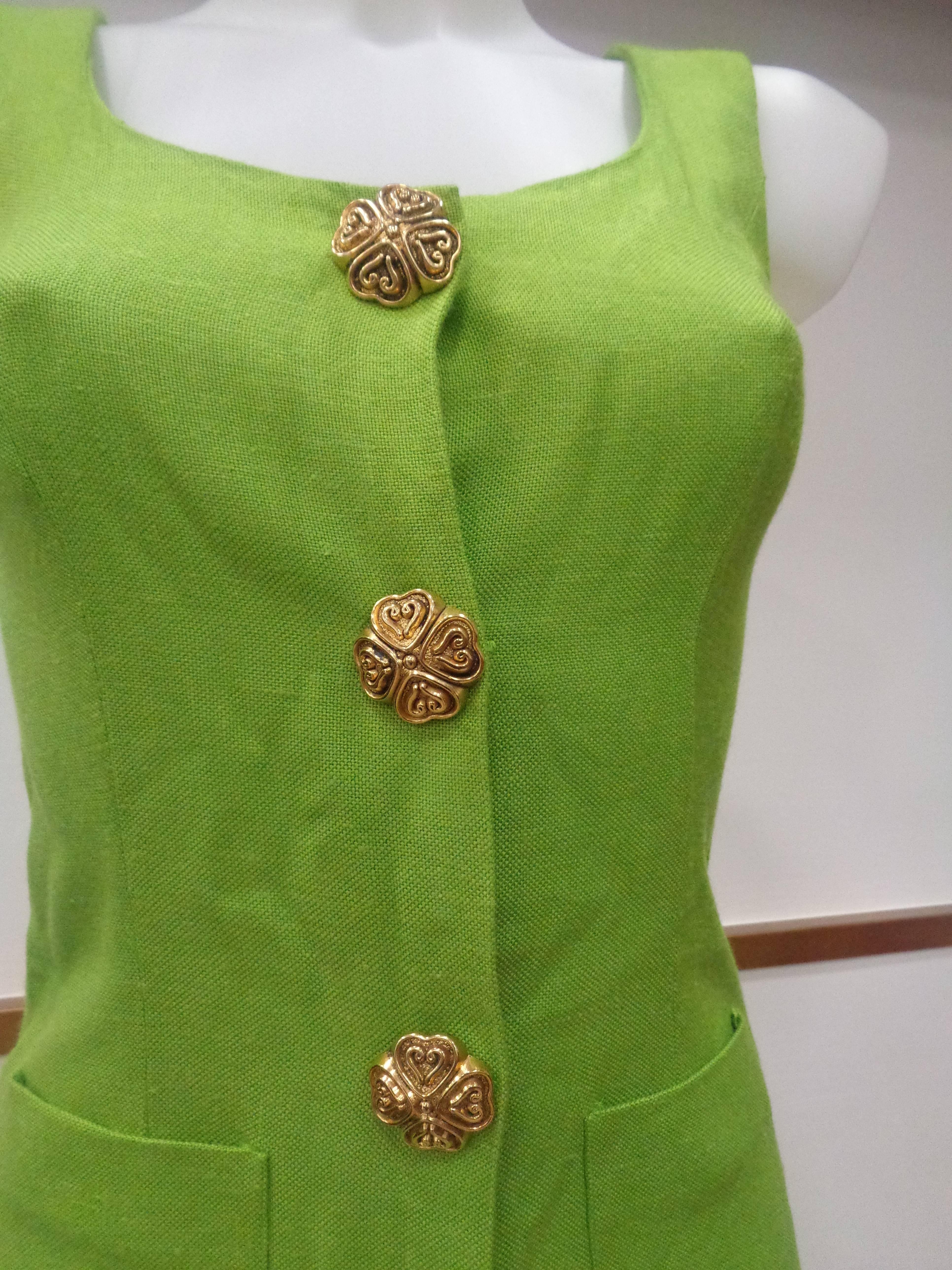 Moschino Green gold tone hardware Dress

Totally made in italy in size 42

Composition: rayon and other