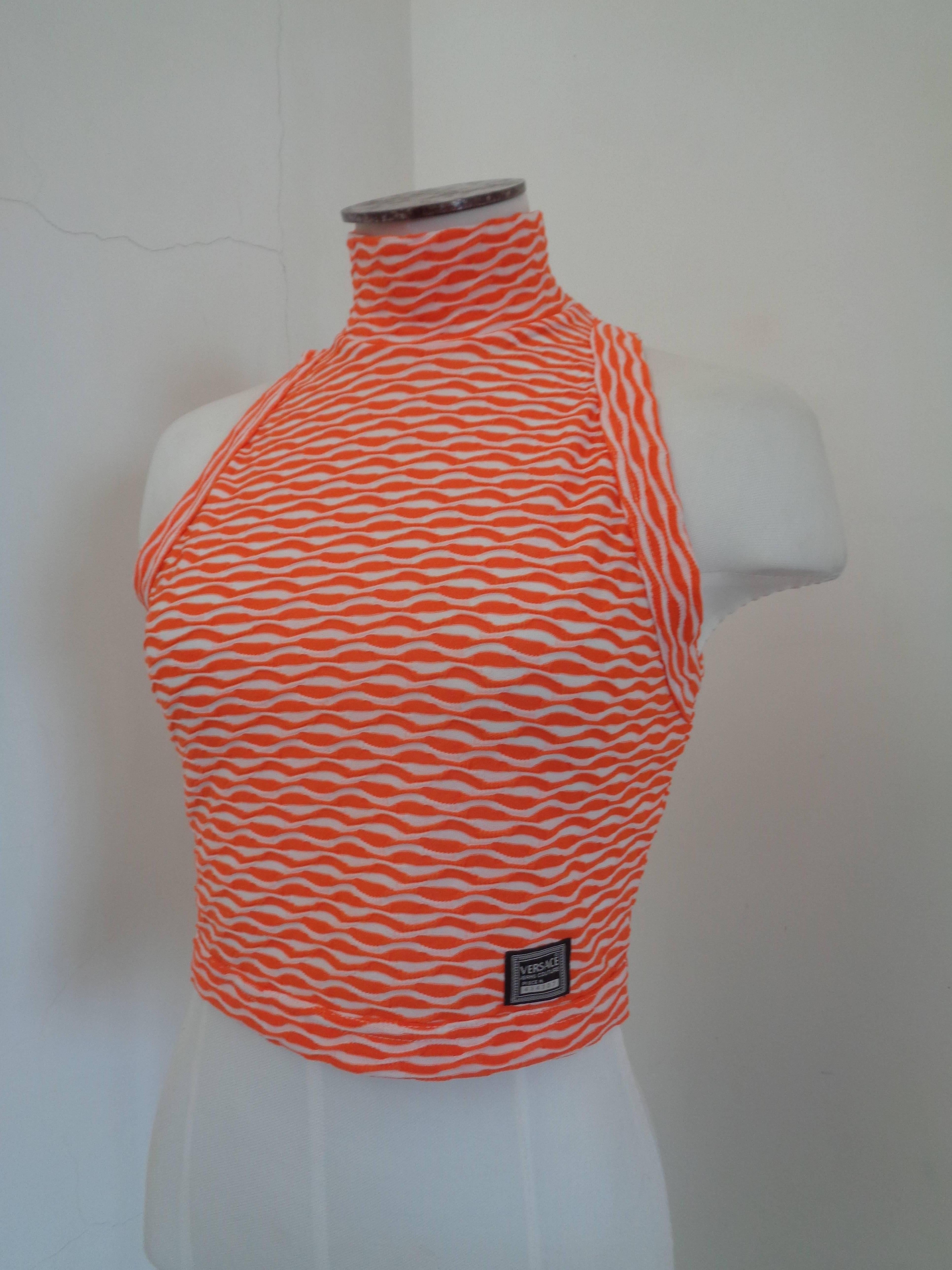 Versace Jeans Couture White Orange top

Totally made in italy in italian size range S

Composition: Polyestere