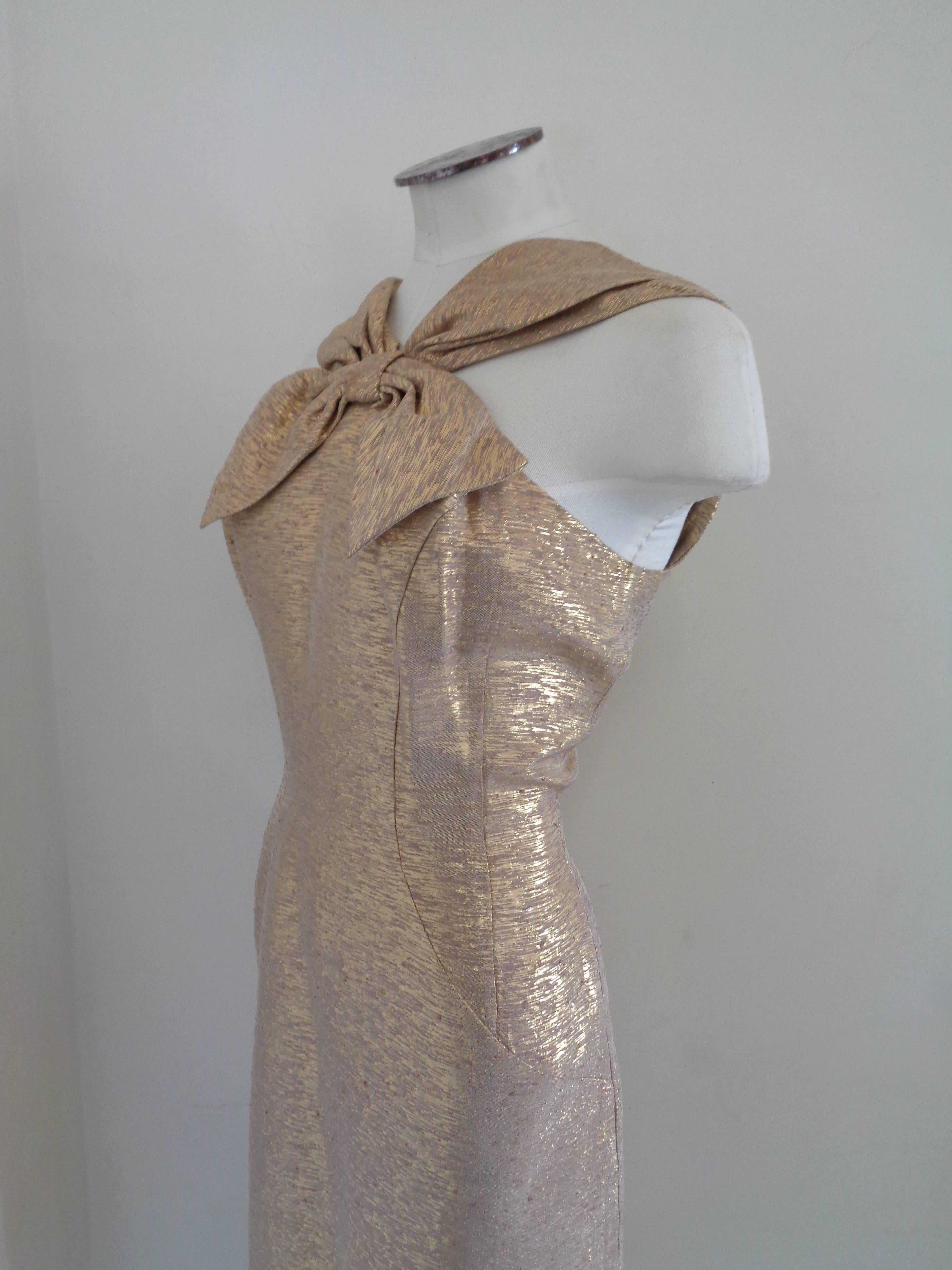 1980s Vintage Gold tone Tailor Made Dress

totally made in italy in size M 