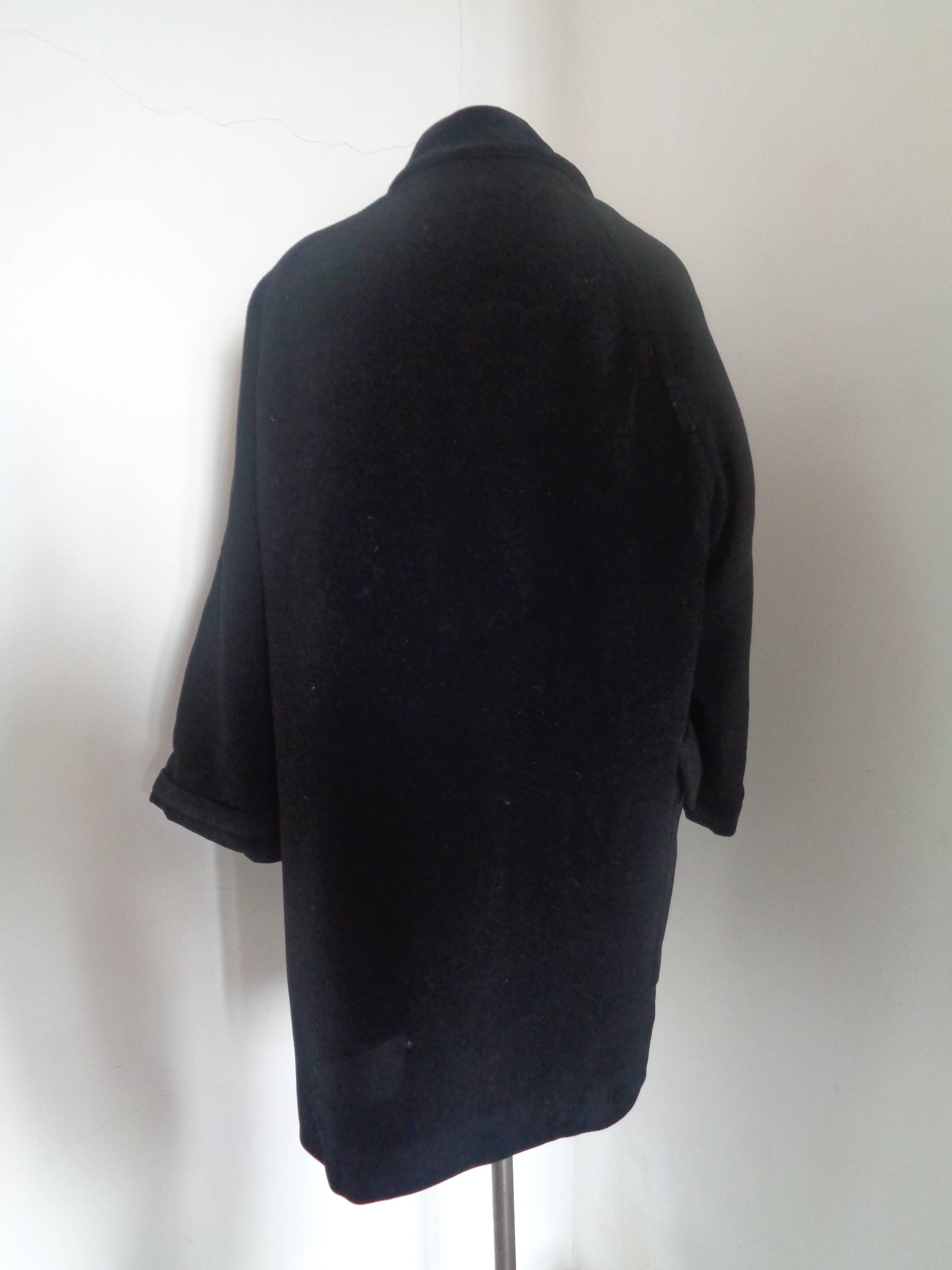 Moschino Cheap & Chic Black Wool Coat

Totally made in italy in italian size range 42

Composition: Wool and other