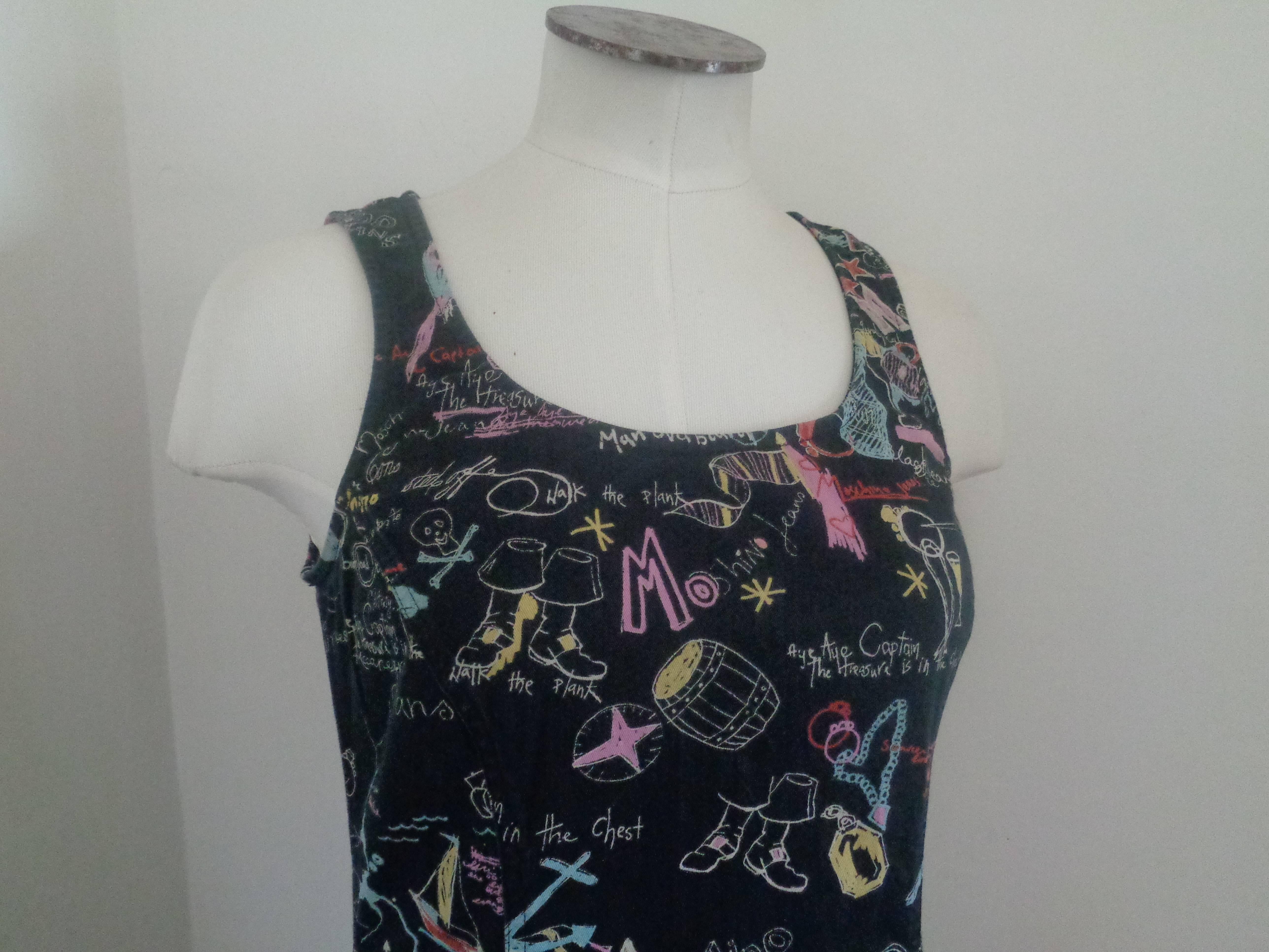 Moschino Jeans - Robe en coton imprimé

Totalement fabriqué en Italie en taille 44

En coton

Agrémenté d'un petit poignet avec matériel argenté