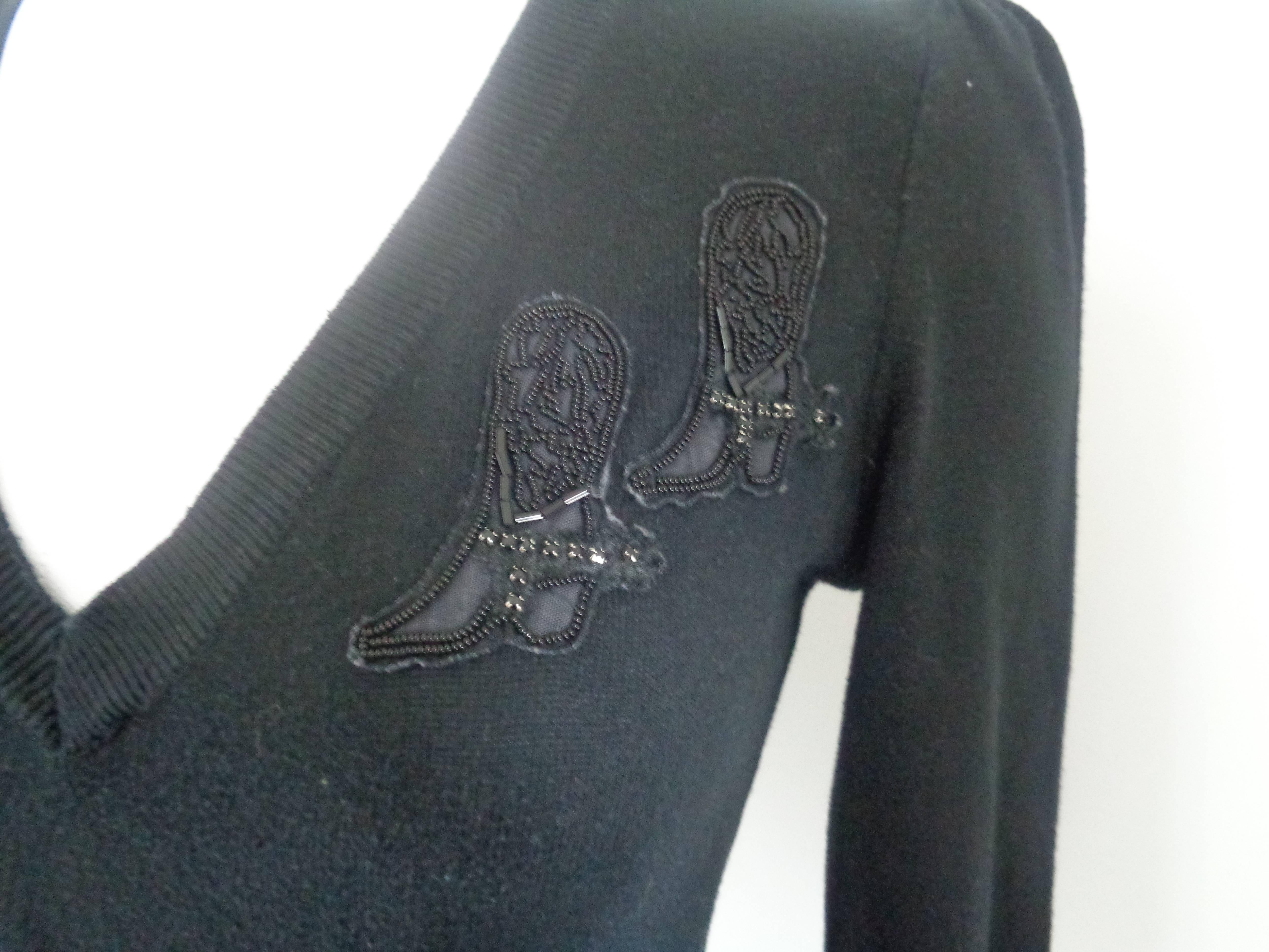 Camicia in cotone con stivali neri Moschino
totalmente made in italy in taglia 40
