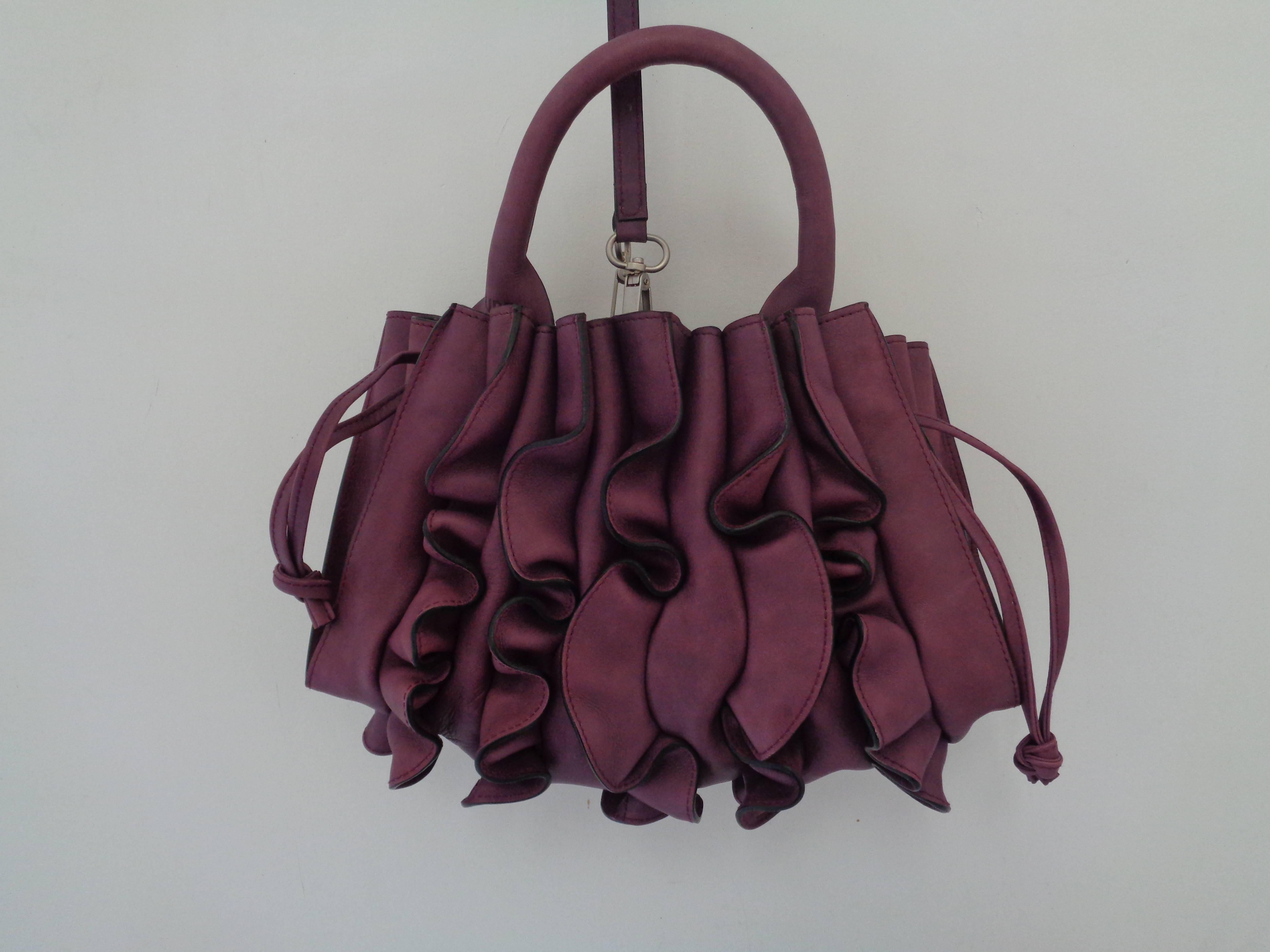 2013/2014 Fall-Winter Lupo Barcelona Purple Leather Bag

totally made in spain in 100% Calf leather

Unworn still with dustbag

San be worn as satchel, shoulder bag handle bag