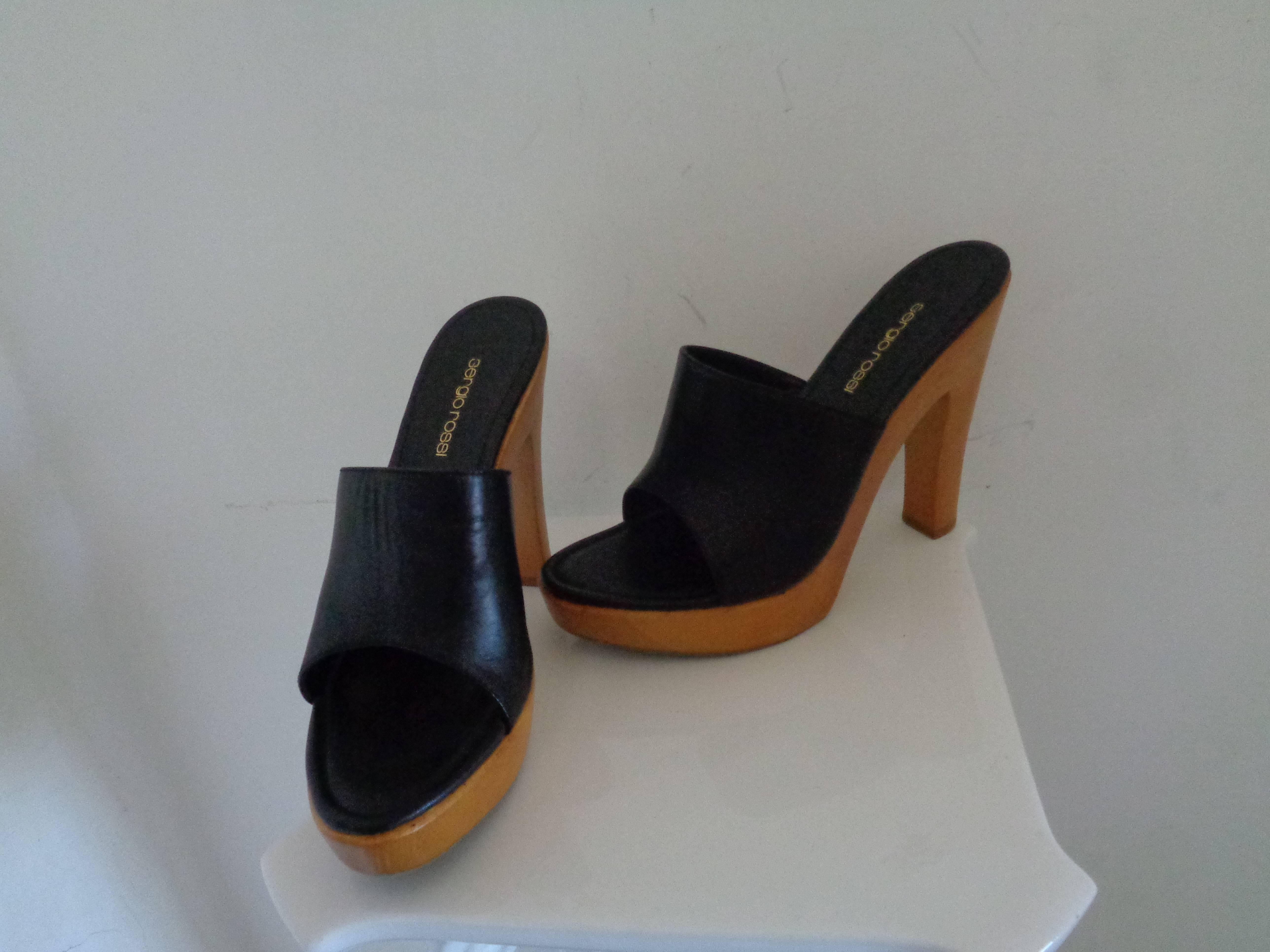 Sergio Rossi Black Clog

totally made in italy in size 39
unworn
heel 14 cm