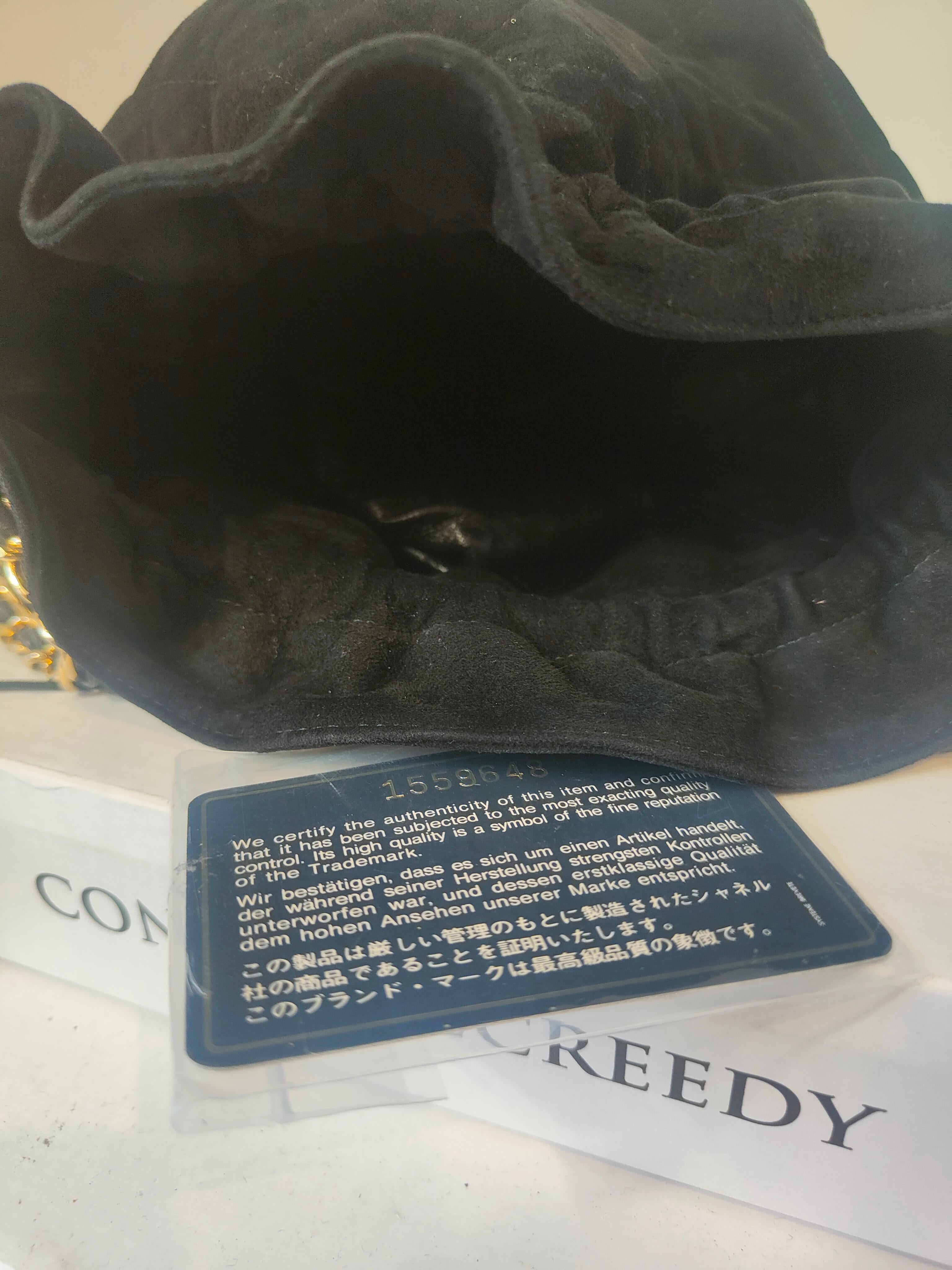 1988 Chanel schwarzer Sessel mit Goldbeschlägen (Schwarz) im Angebot
