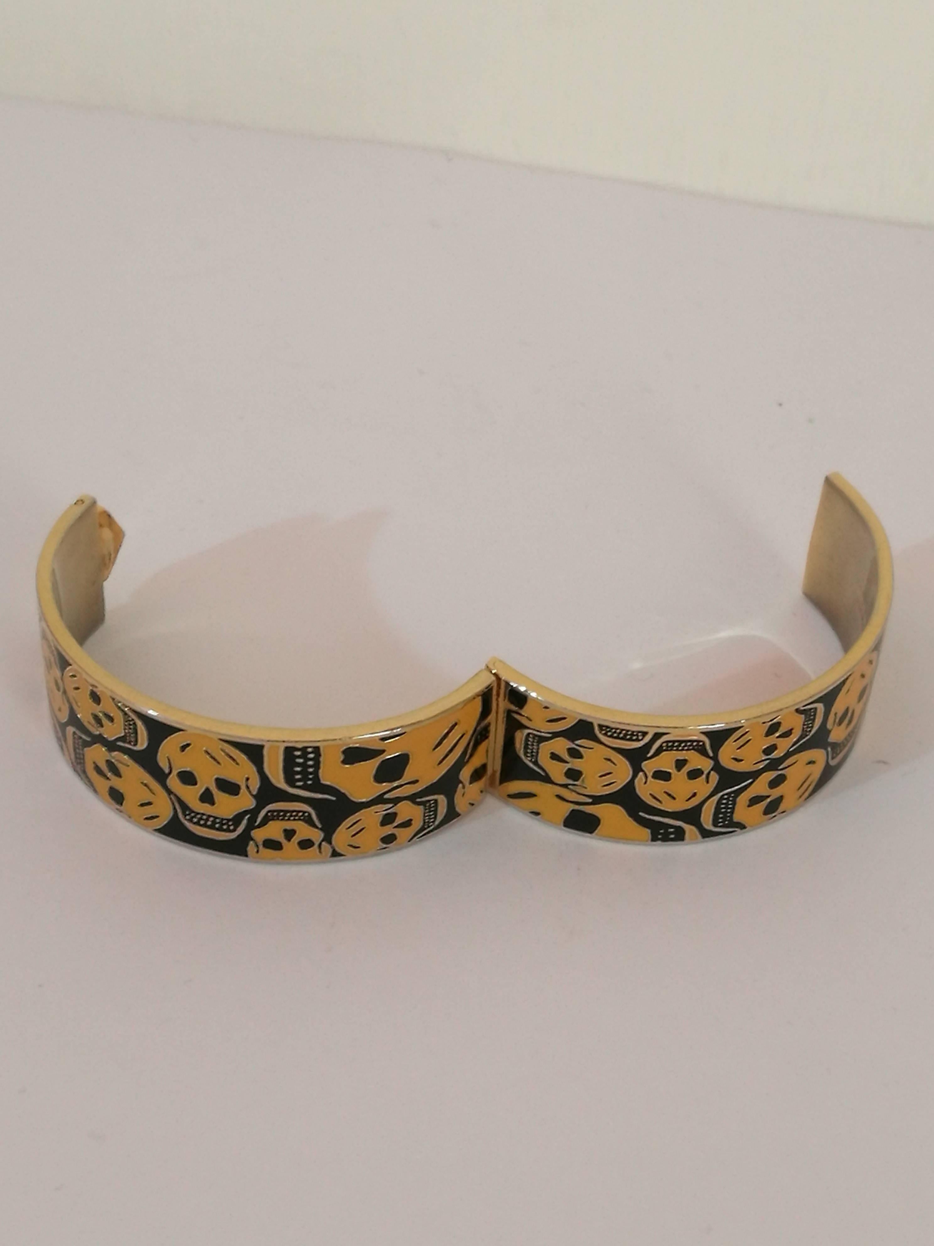 Alexander McQueen Gold tone Skulls black Bracelet 1