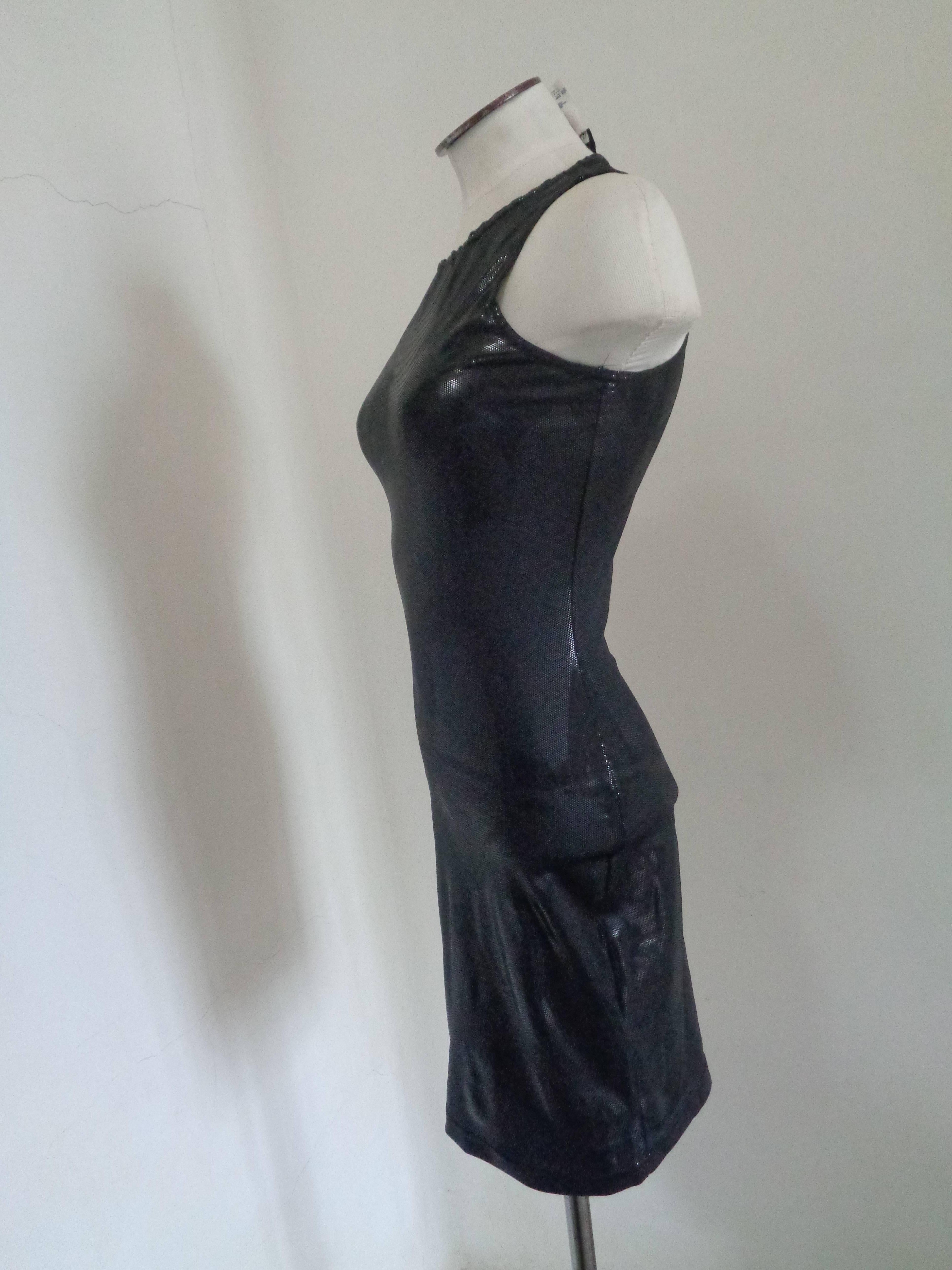 Versace Jeans couture black dress

totally made in italy in size 42

composition: polyamide and spandex