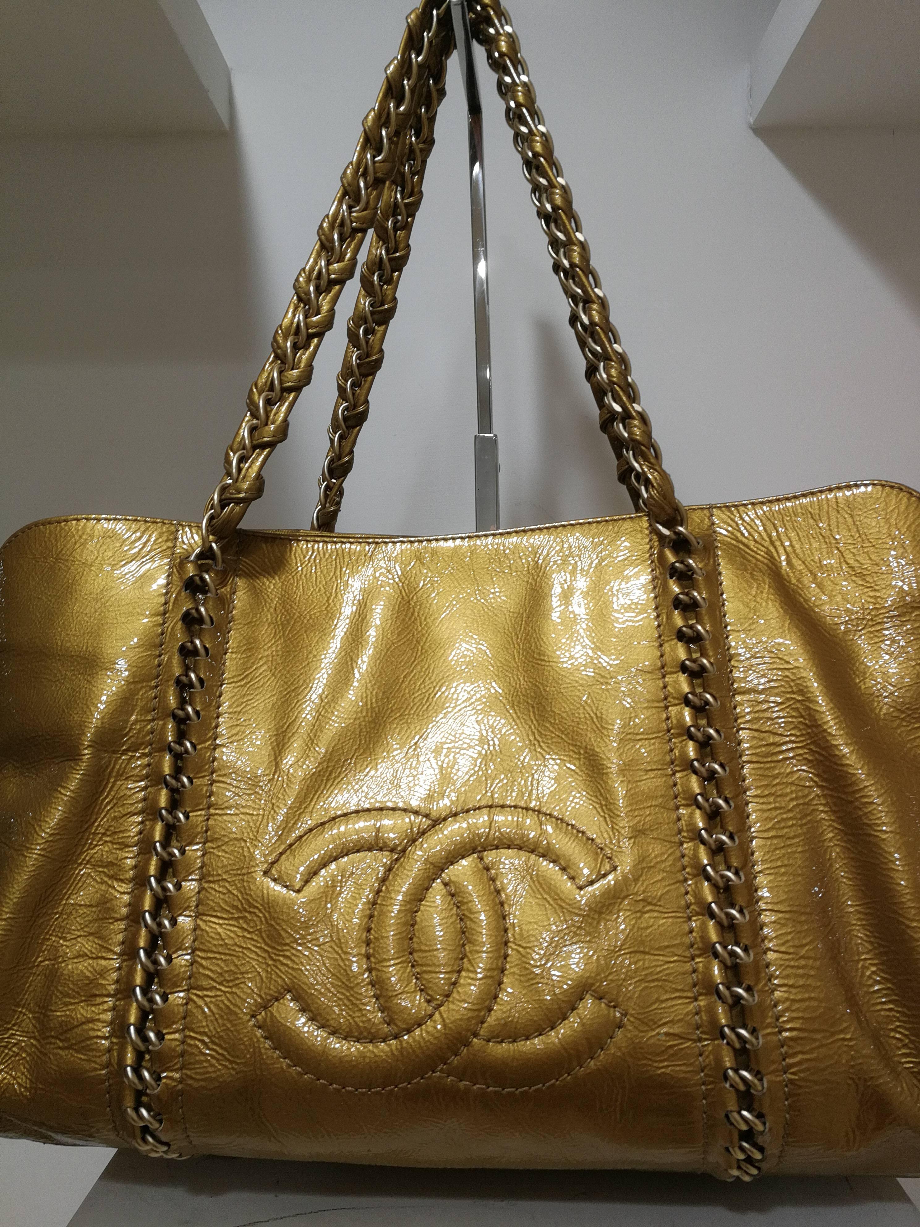 Brown Chanel gold patent leather shoulder bag