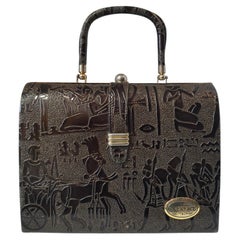 Borsa di Gianni Versace degli anni ’90 ispirata all’Egitto