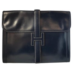 Hermès Jige dark blue navy leather clutch