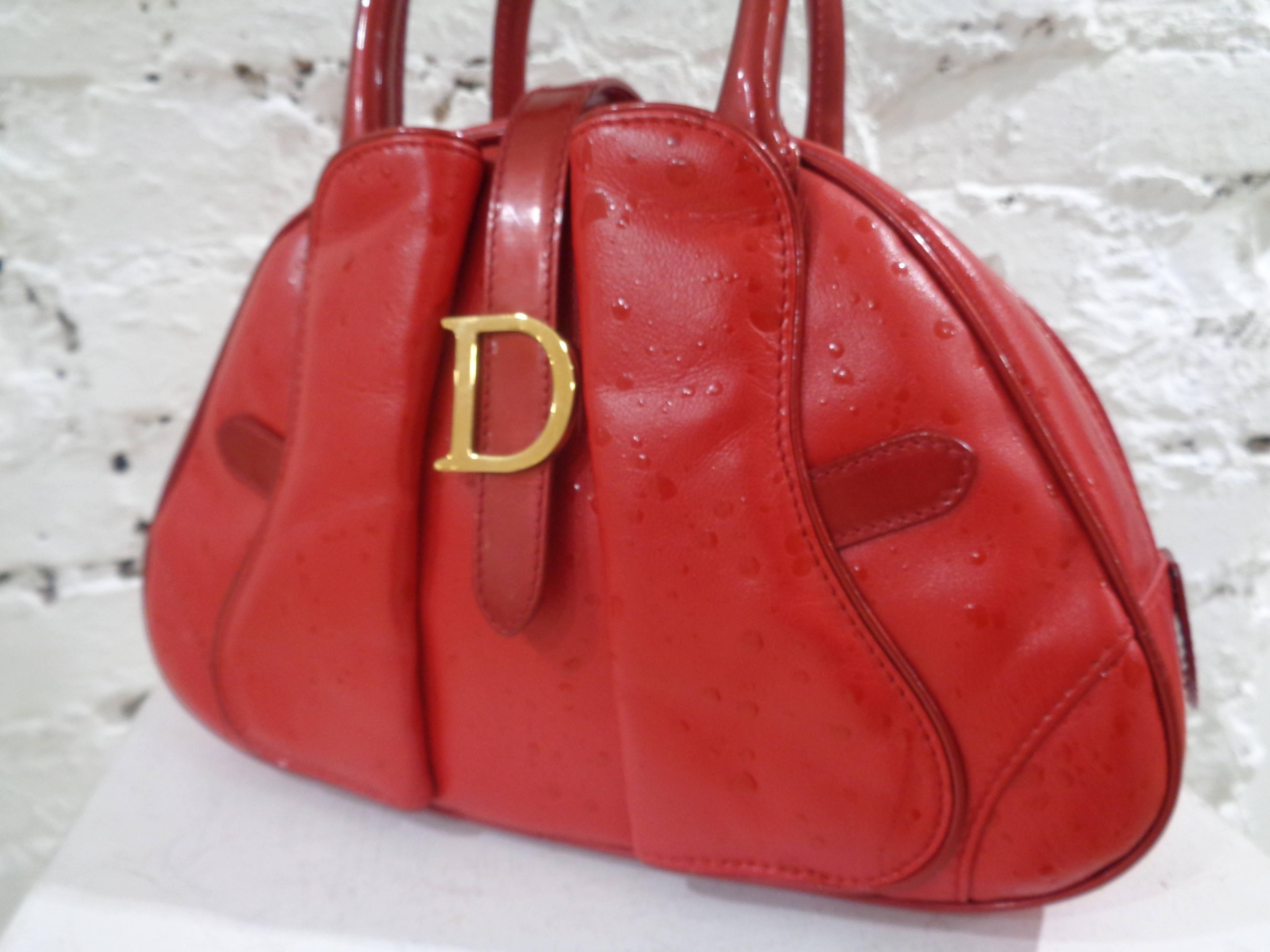 Red Christian Dior red leather ostrich stamp handbag