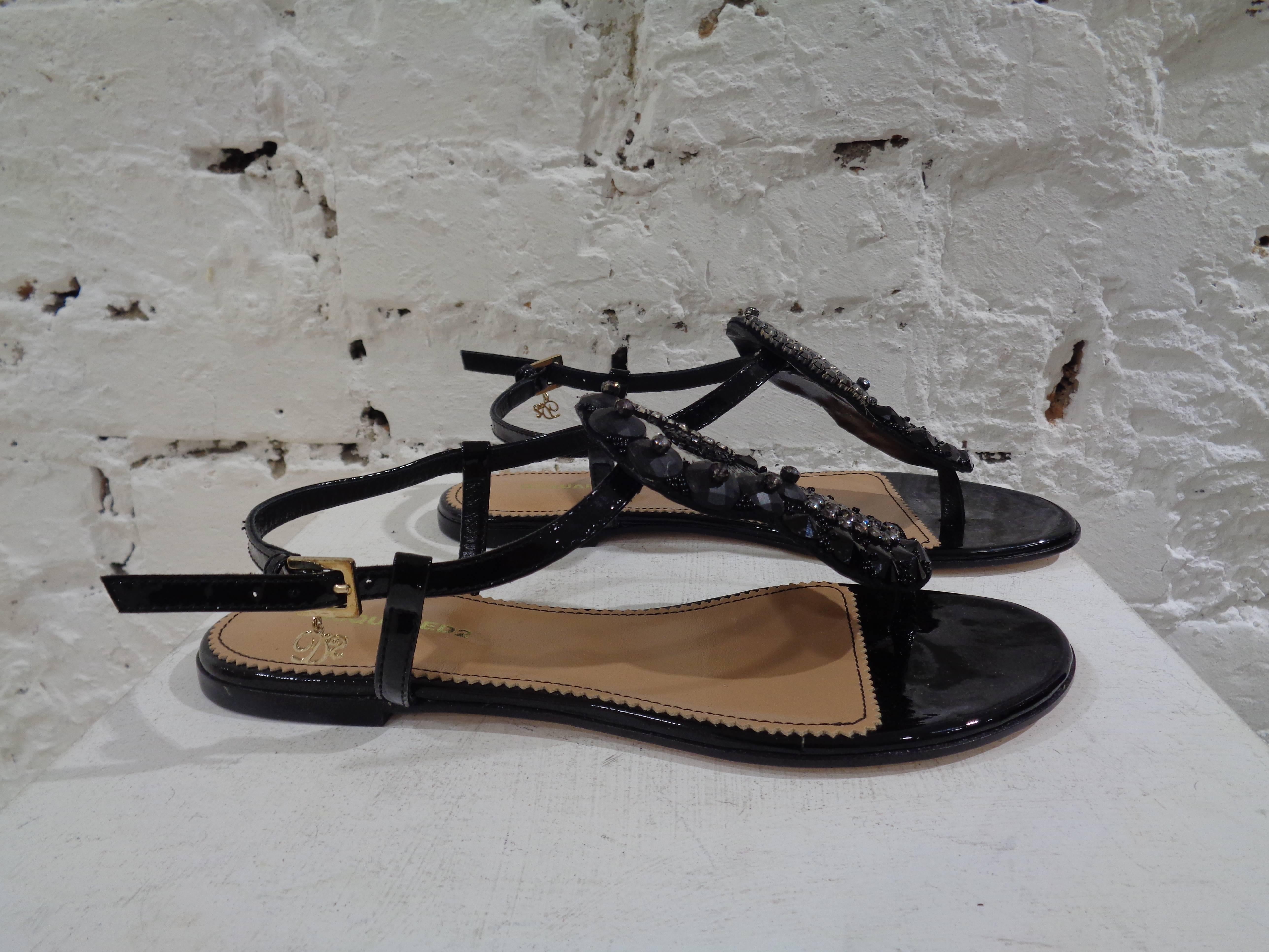 Dsquared2 Black leather embellished sandals

totally made in italy in size 37

still with box

unworn