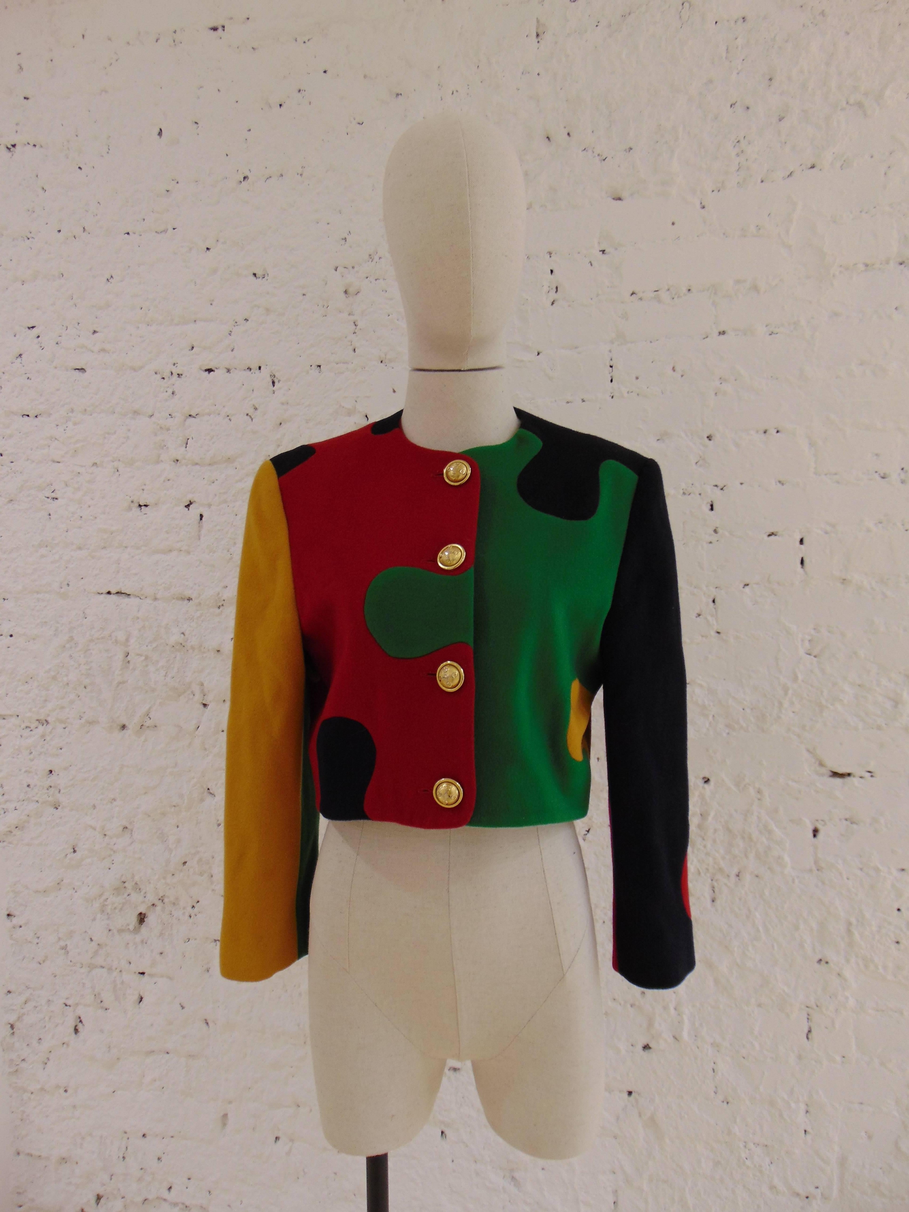 Iconic vintage Franco Moschino puzzle jacket
A Moschino Puzzle Jacket, 1990s, with black, yellow, red and green puzzle pieces, goldtone buttons, fully lined. 
totally made in italy
size 40 it