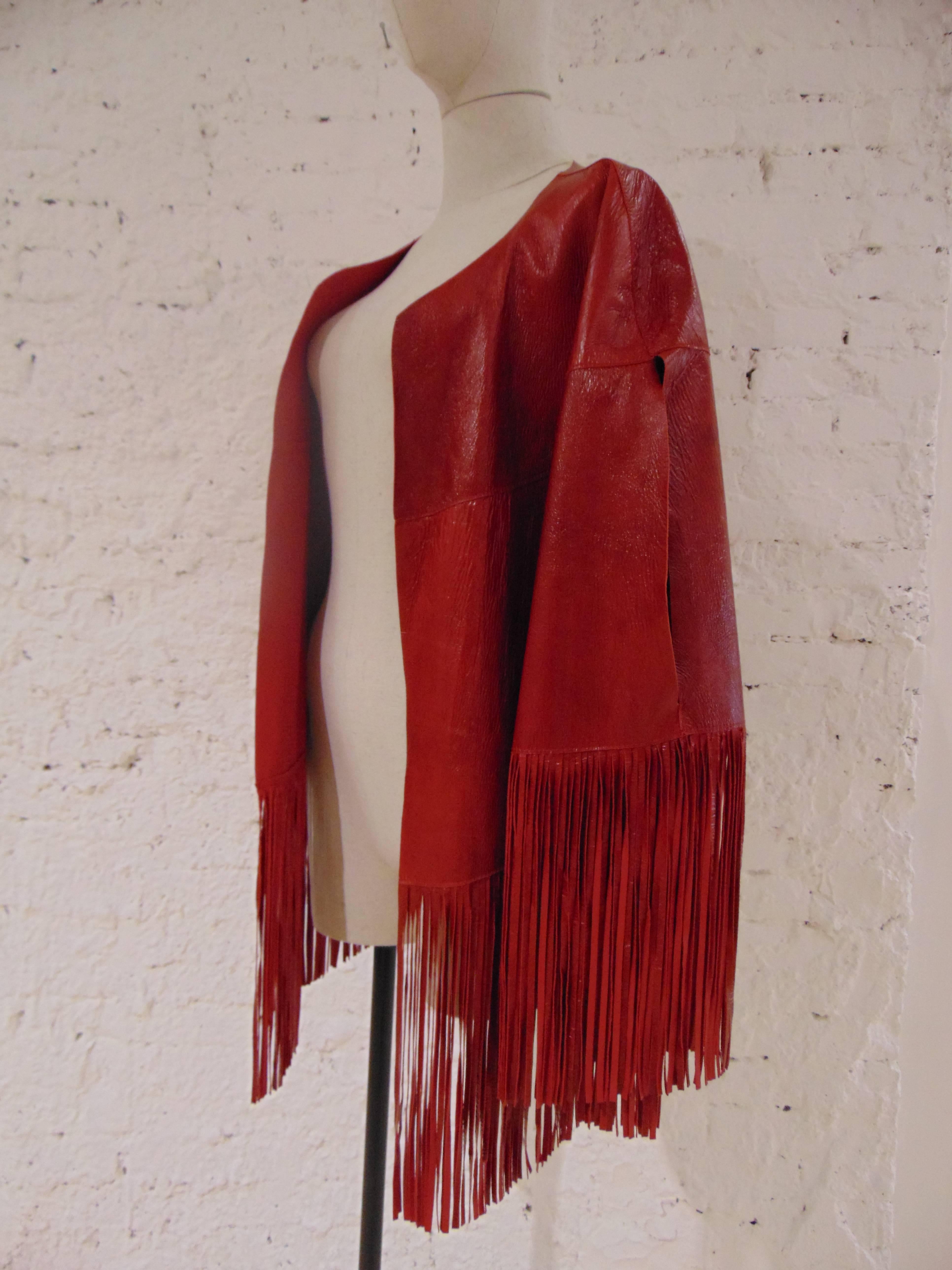 Leitmotiv unworn NWOT real leather red fringes jacket
totally made in italy in size OS