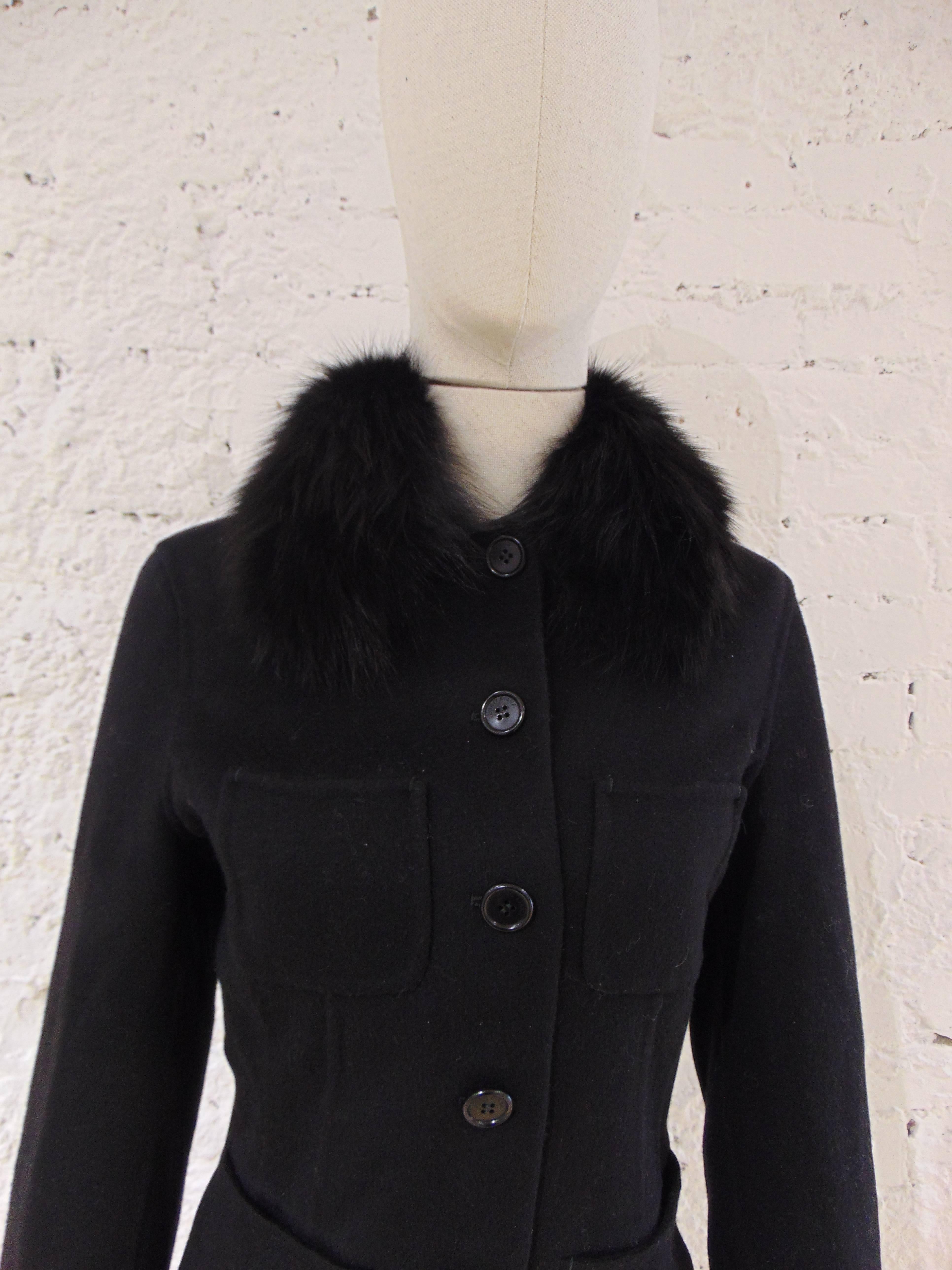 Loro Piana black wool cachemire fox fur Jacket

Loro Piana black jacket totally made in italy with real puter collar shadow fox fur

Size 44

