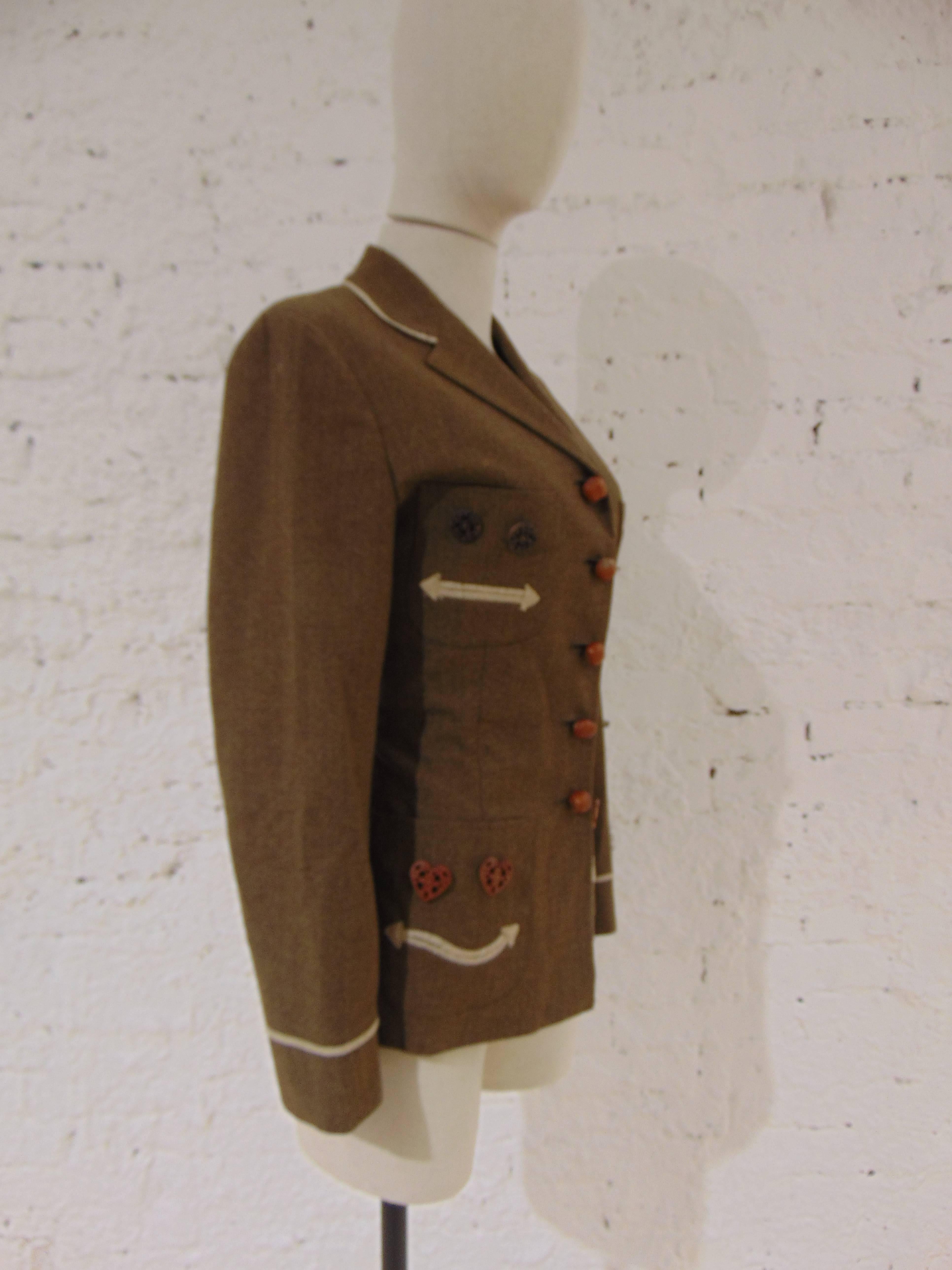1980s Moschino Cheap & Chic unique jacket
unique jacket with nuts and smiles in brown tone
wool made in italy in size M 
