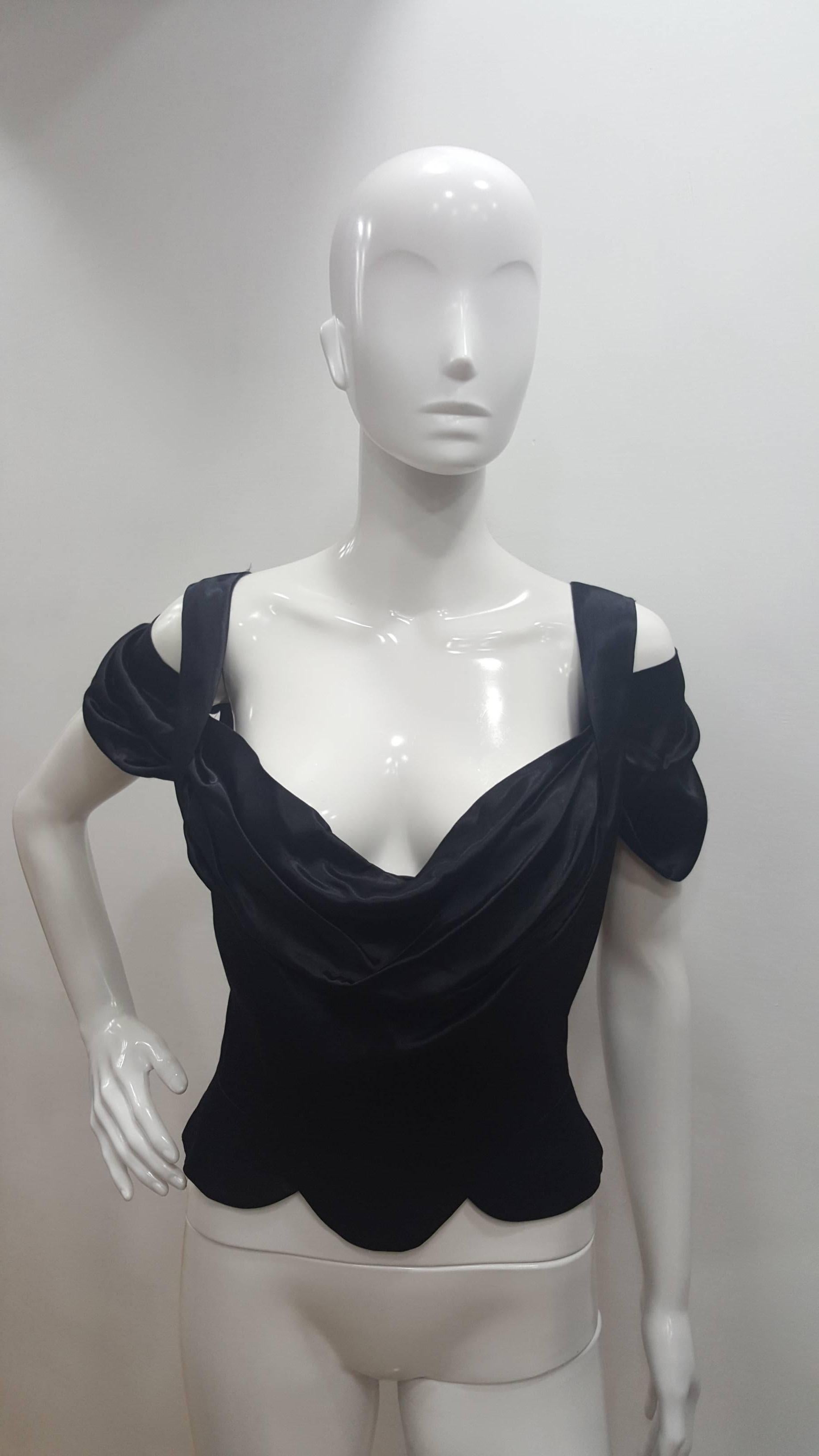 1990s Vivienne Westwood black corset 
100% viscose
Totally made in italy
Available in 2 sizes:
1 Italian size range 40
1 Italian size range 44