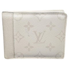 Portefeuille multiple Louis Vuitton Monogram Antartica