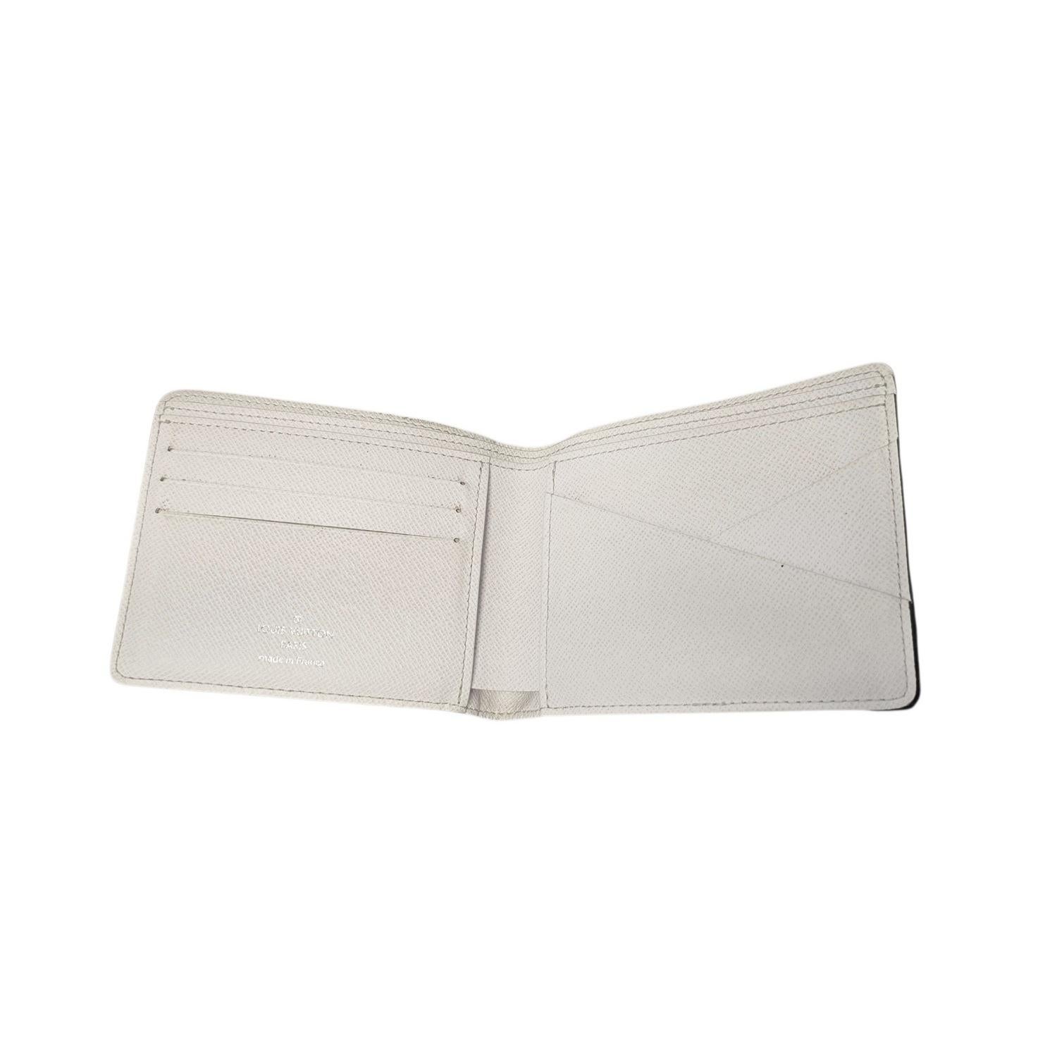 Portefeuille multiple Louis Vuitton Monogram Antartica Excellent état - En vente à Scottsdale, AZ