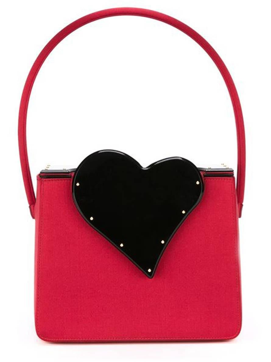 Black and red silk heart motif evening bag from Yves Saint Laurent Vintage featuring a square-shaped box shape (19cm x 16cm), a bakelite black heart with gold-tone decorative studs, a front metallic snap opening,a silk inside lining. Total length :