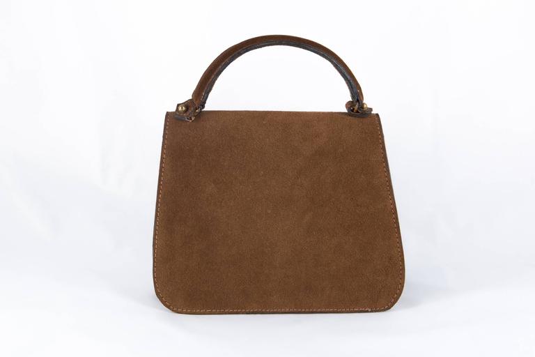 1960s Brown Suede Top Handle Bag with Lion Head For Sale at 1stdibs