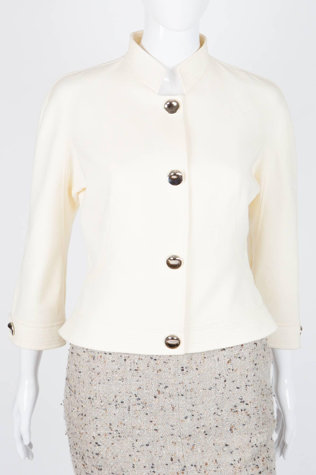 Thierry Mugler Couture Runway cream cotton jacket featuring silver tone fancy decorative buttons with under front snap button, a fitted waist, 3/4 sleeve length.
In excellent vintage condition. Made in France.
We guarantee you will receive this