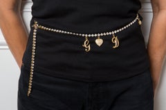 Cinturón de cadena con dijes dorados de Dolce & Gabbana