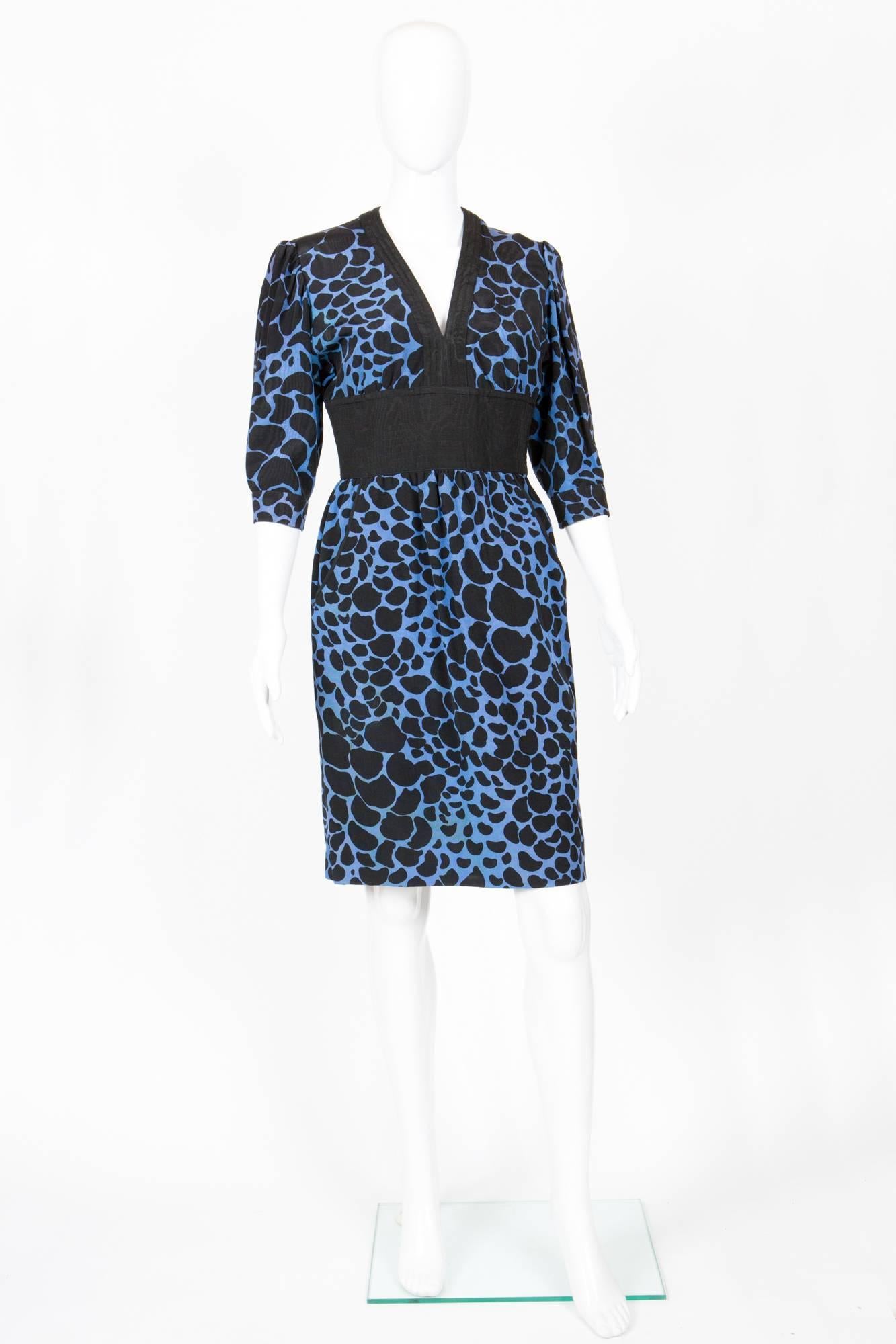 1980s Balenciaga blue silk moire dress featuring  a black spot print, black silk moire contrasted waistband, gold tone buttons, a side zip opening. 
In good vintage condition. Made in France.
Label Size 42fr but Estimated size 38fr/US6 /UK10 //