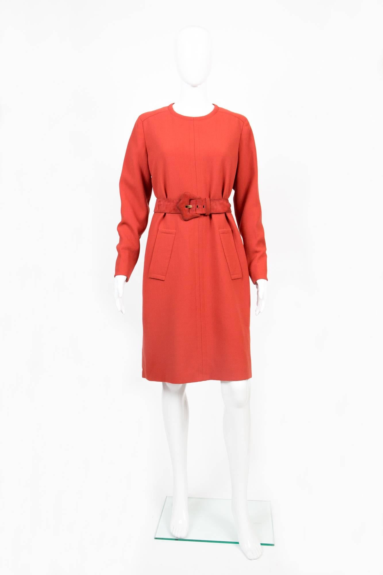 1960s Givenchy Haute Couture mandarine wool crepe dress featuring long sleeves,center front seam, shoulder yokes, front patched pockets, center back zip, a separated suede matching color belt, ( 1,5in. (4,5cm) x 39,3in. (100cm) ) fully silk