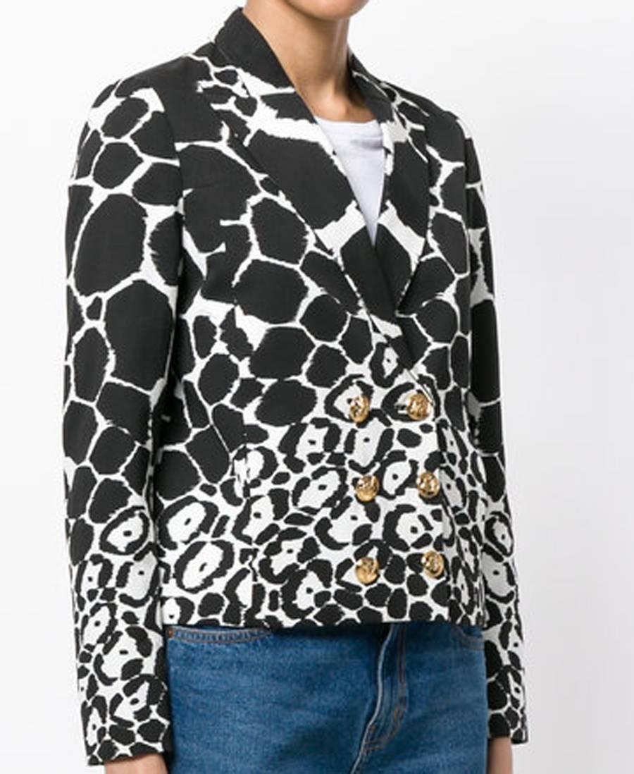 Gucci black & white animal cotton print double-breasted jacket featuring peaked lapels, a double breasted front fastening, long sleeves, side slit pockets, a straight hem, an animal print and gold-tone buttons. 
100% cotton
In excellent vintage