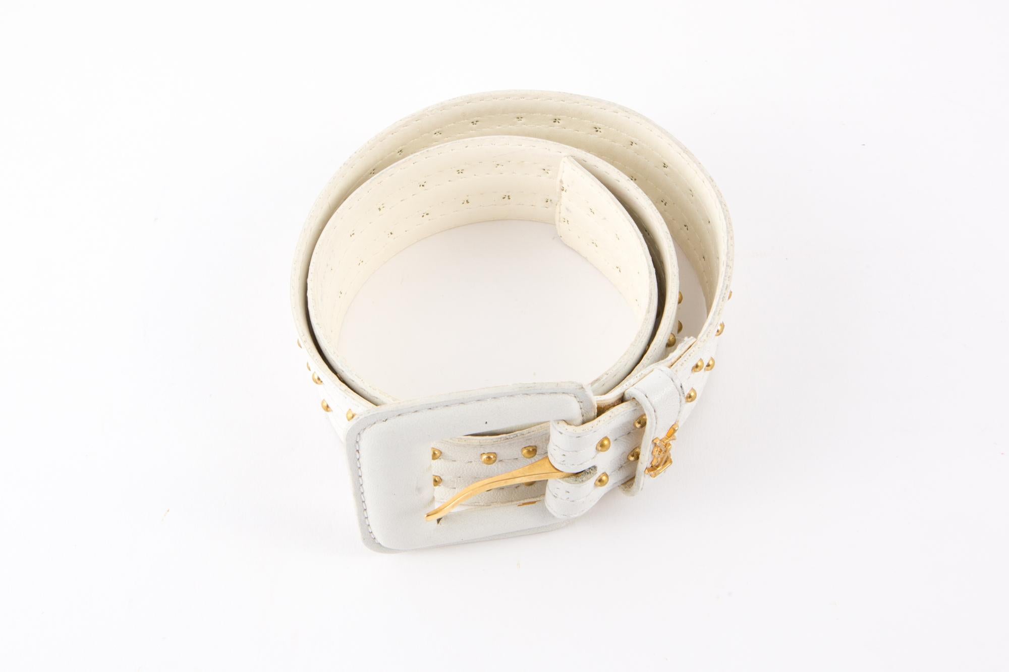 Yves Saint Laurent white leather belt featuring  gold tone studs, an inside white leather lining. 
In good vintage condition( some marks on the inside belt) Made in France.
Estimated size  75 cm
We guarantee you will receive this gorgeous item as