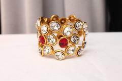 Early 1990s Chanel Cuff with Gilt Metal and White and Red Crystals