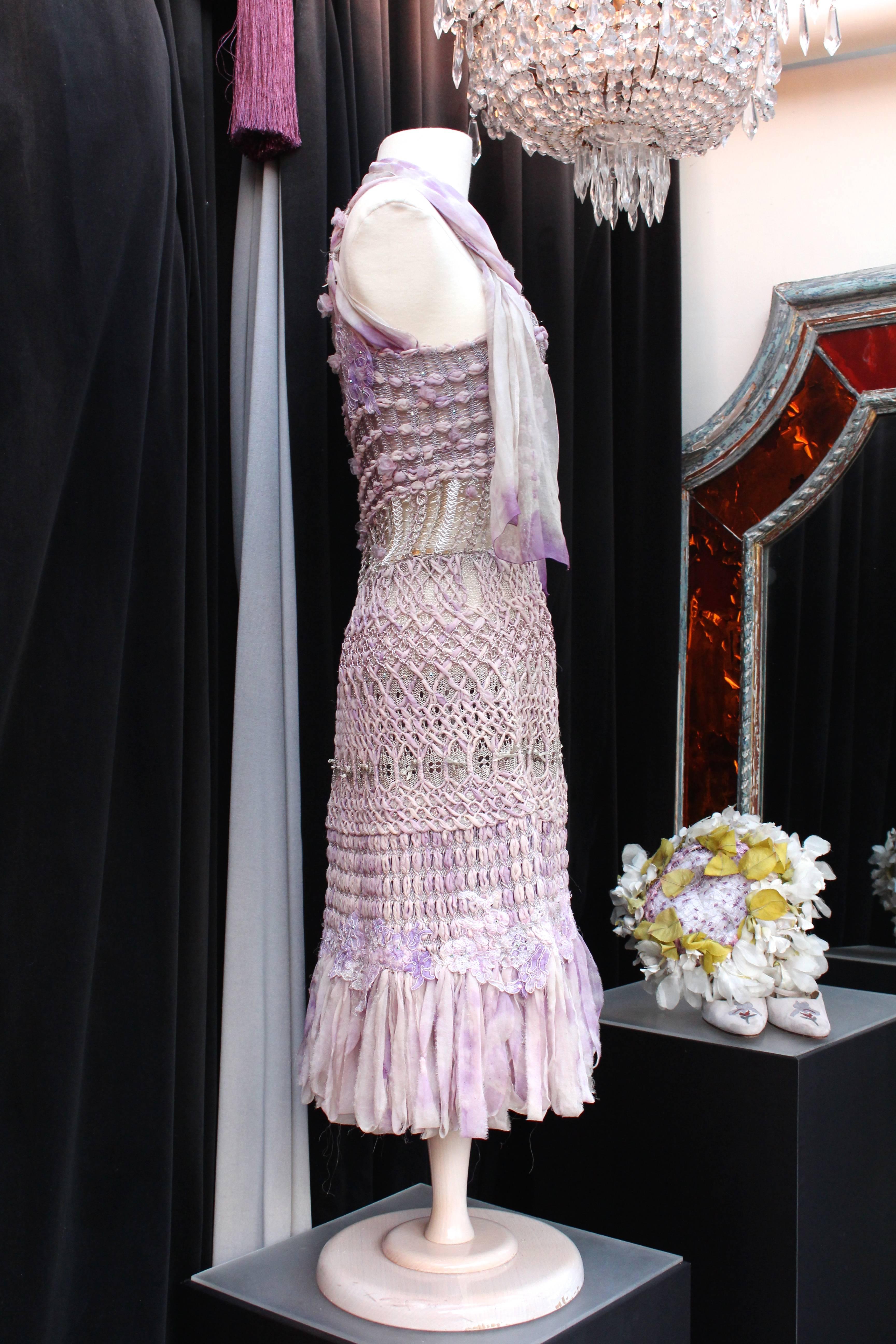 CHRISTIAN LACROIX (Haute Couture) Dress composed of knitting crochet of several fabric in parma tie and dye shades interlaced with silk muslin and lame threads and adorned with multiple small silver metal bows and white Swarovki crystals displayed