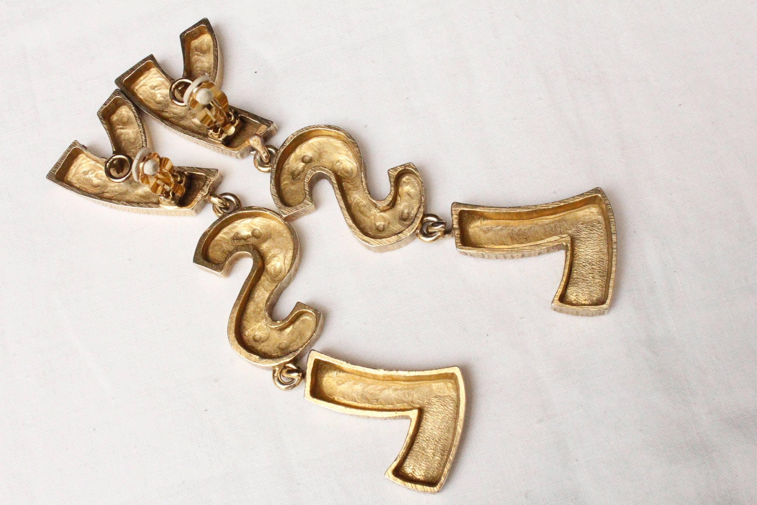 Women's Yves Saint Laurent YSL gilded metal earrings, 1990s 