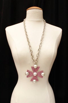 1980s, Yves Saint Laurent long necklace with a pink rhisnestone pendant cross